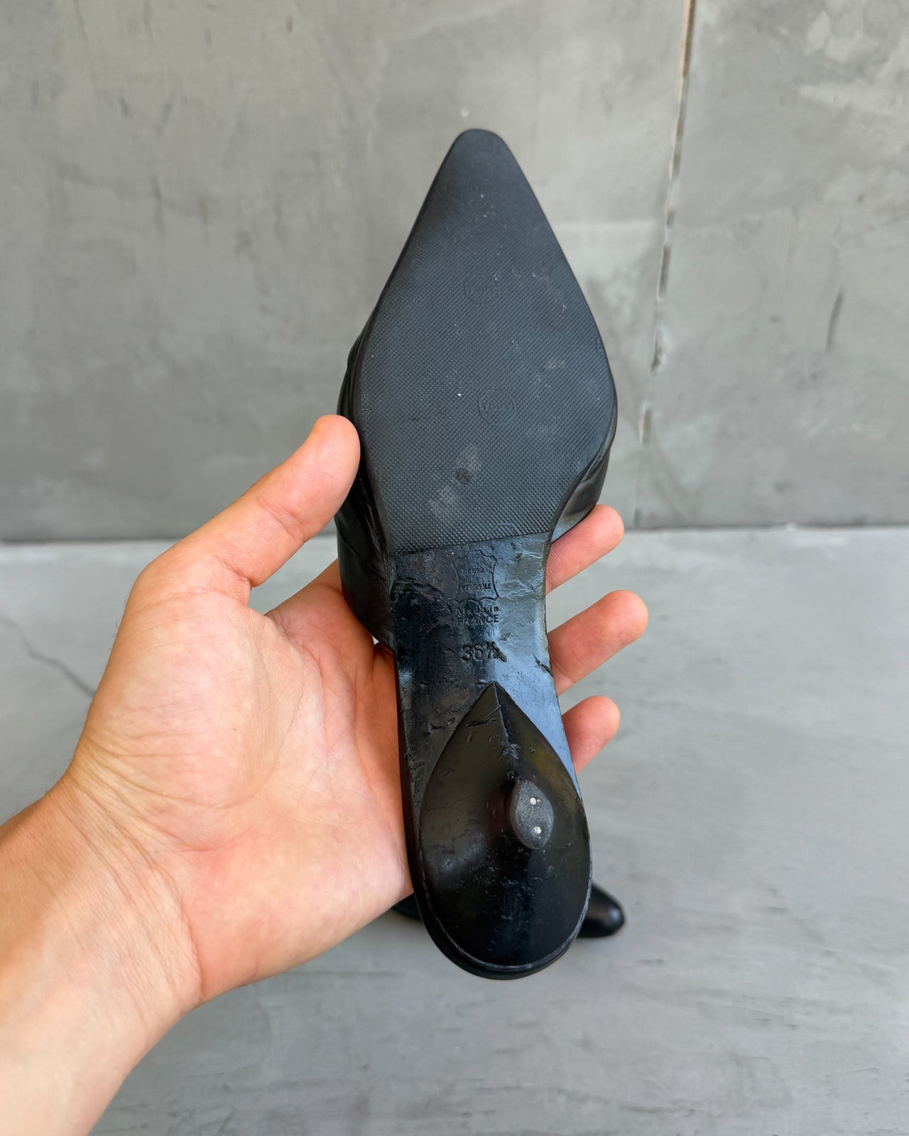 Kenzo Black Leather Kitten Heel Mule – EU 36.5-on a concrete background