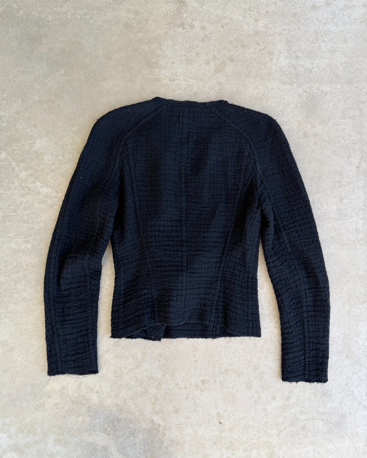 Isabel Marant Asymmetric Black Wool Jacket – S-on a concrete background