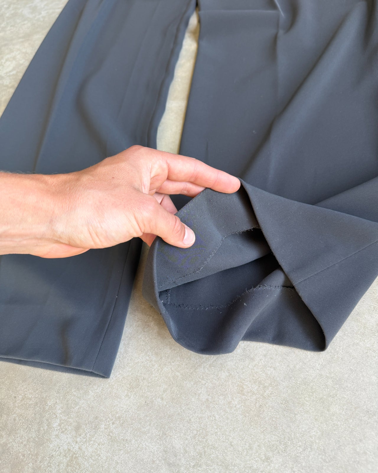 Giorgio Armani Grey Polyester Wide Leg Trousers – M-on a concrete background