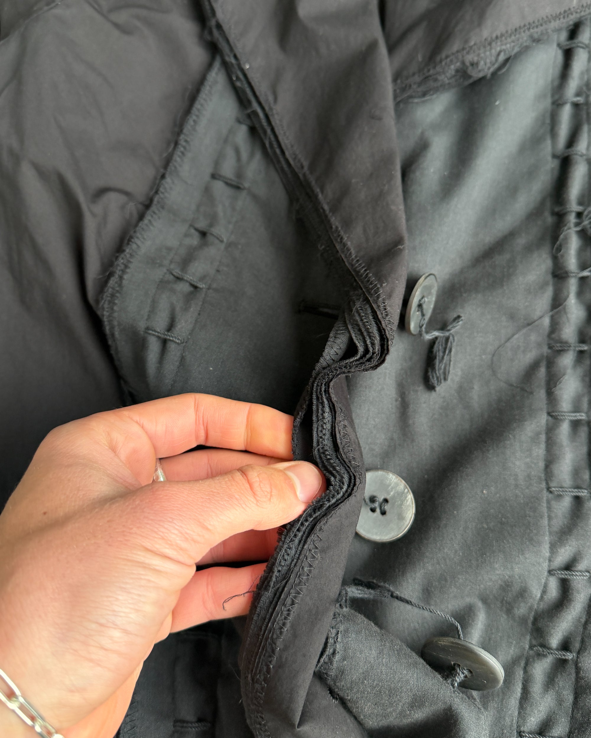 Issey Miyake SS03 Distressed Cotton Jacket – M-on a concrete background