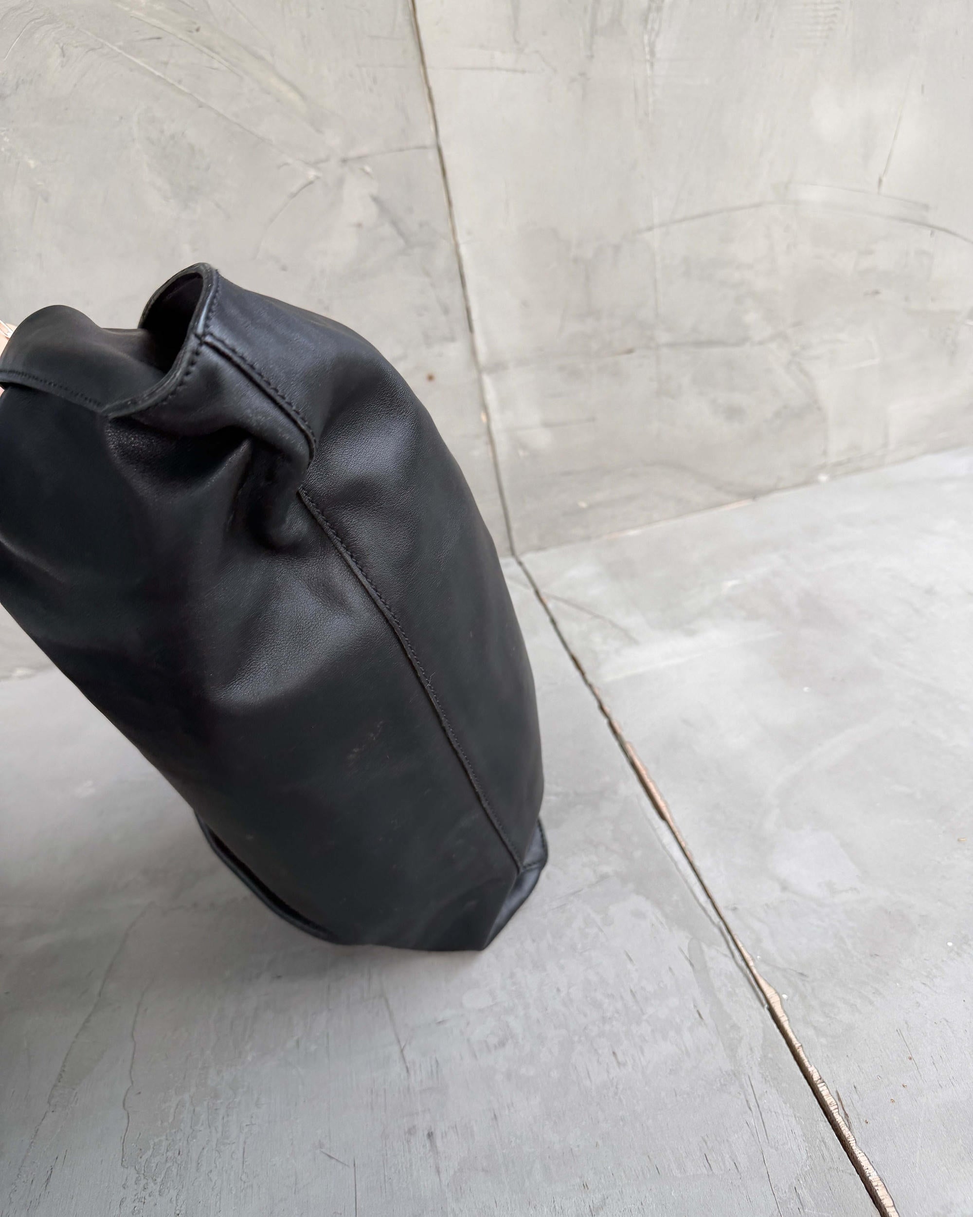 Gucci by Tom Ford Ruched Leather Shoulder Bag-on a concrete background