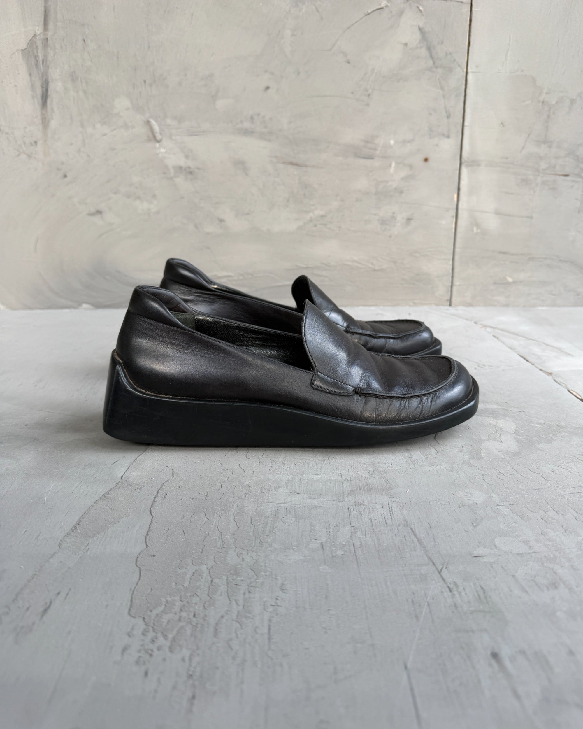 Prada FW99 Leather Extended Sole Loafers – EU 36-on a concrete background
