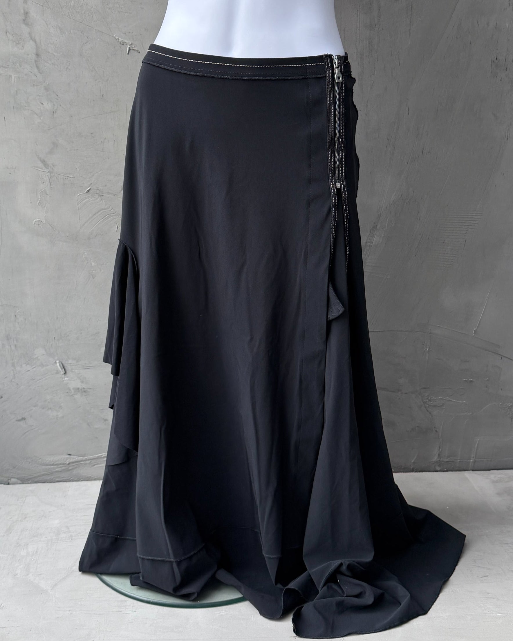 Marithé + François Girbaud Asymmetric Maxi Skirt – S-on a concrete background