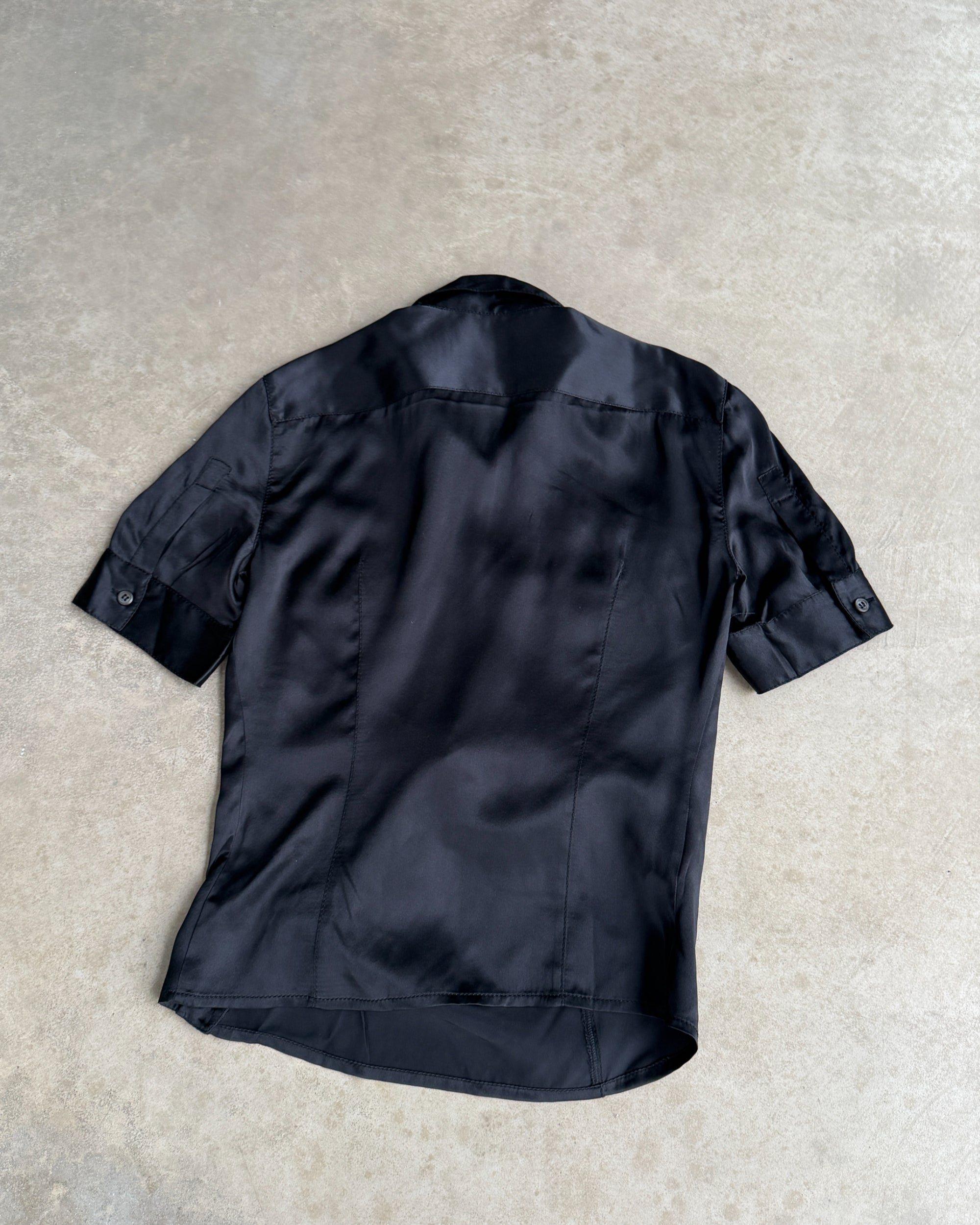 Prada Silk Asymmetric Button-Up Shirt – S-on a concrete background