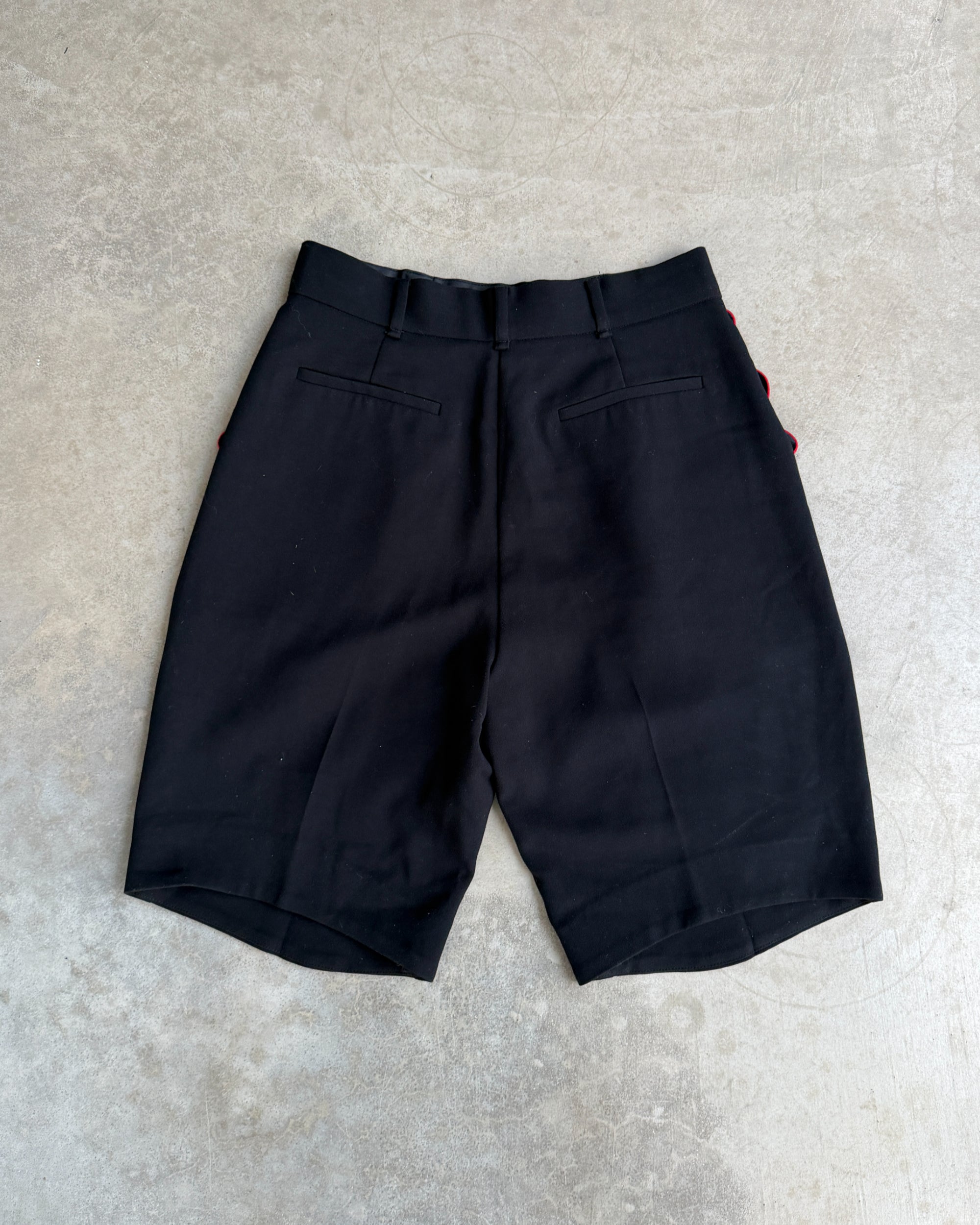 Givenchy Wool and Cotton Bermuda Shorts – M-on a concrete background