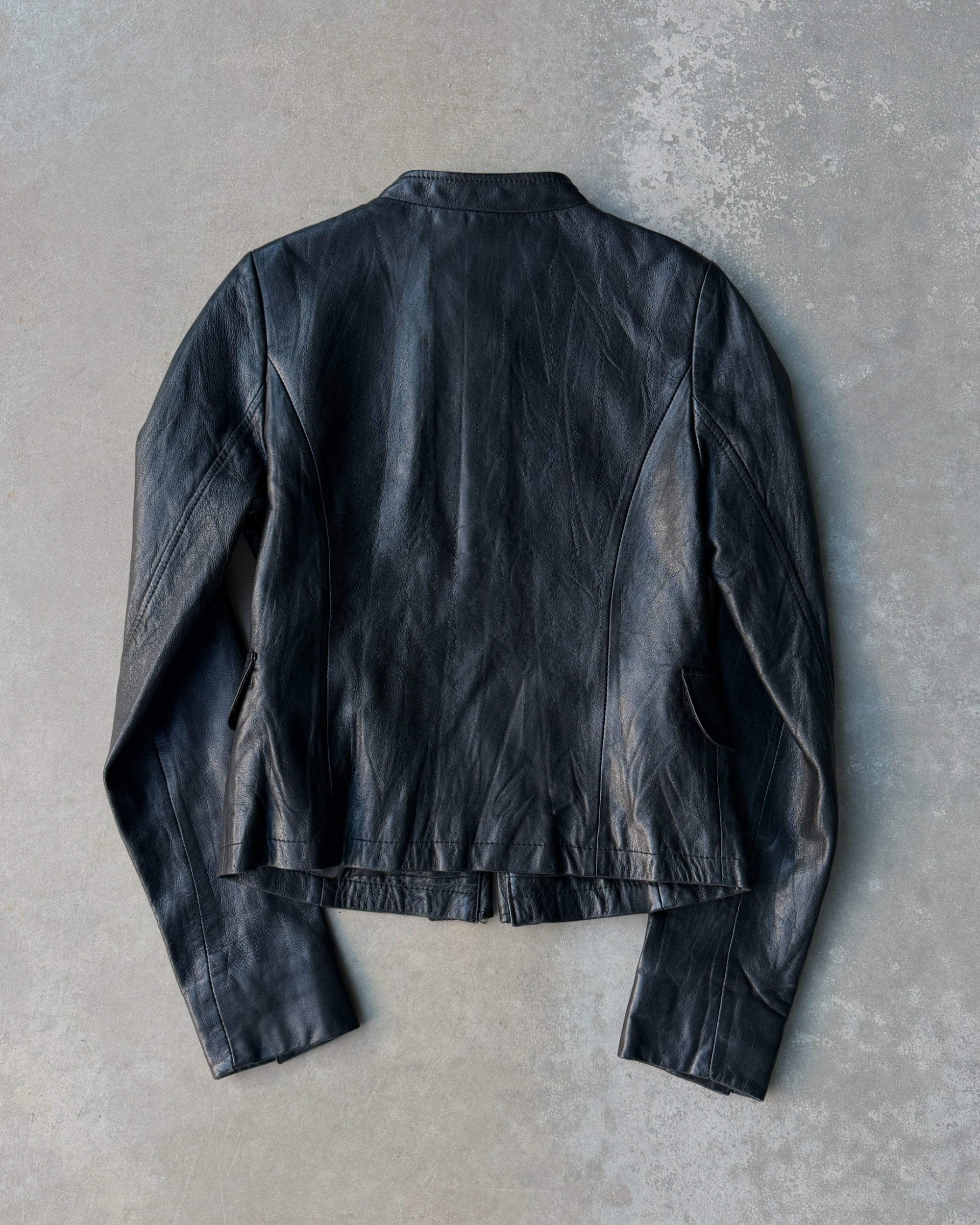 1990s Korean Studded Leather Jacket – S–M-on a concrete background