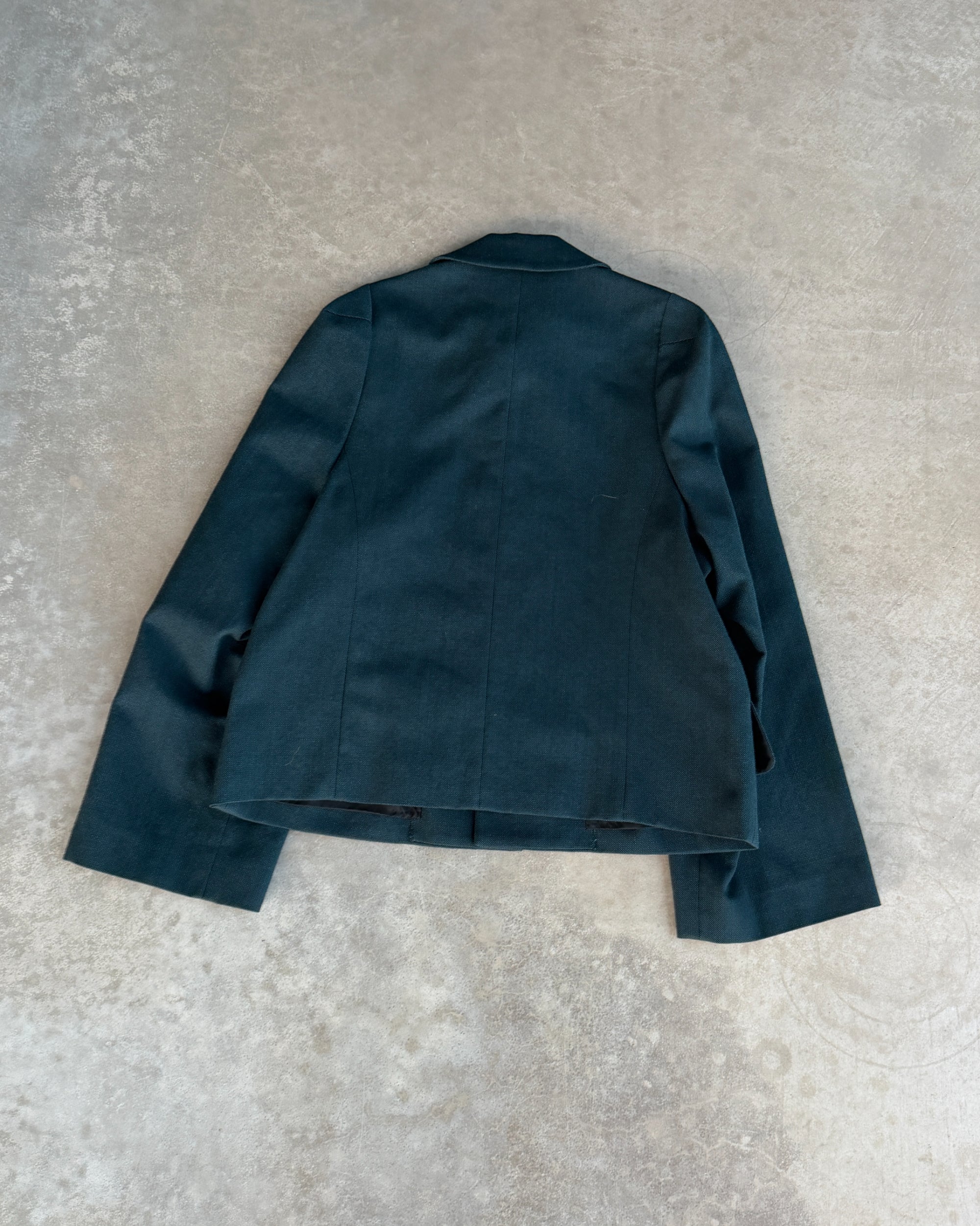 Comme des Garçons Tricot FW96 Wool Jacket – M-on a concrete background