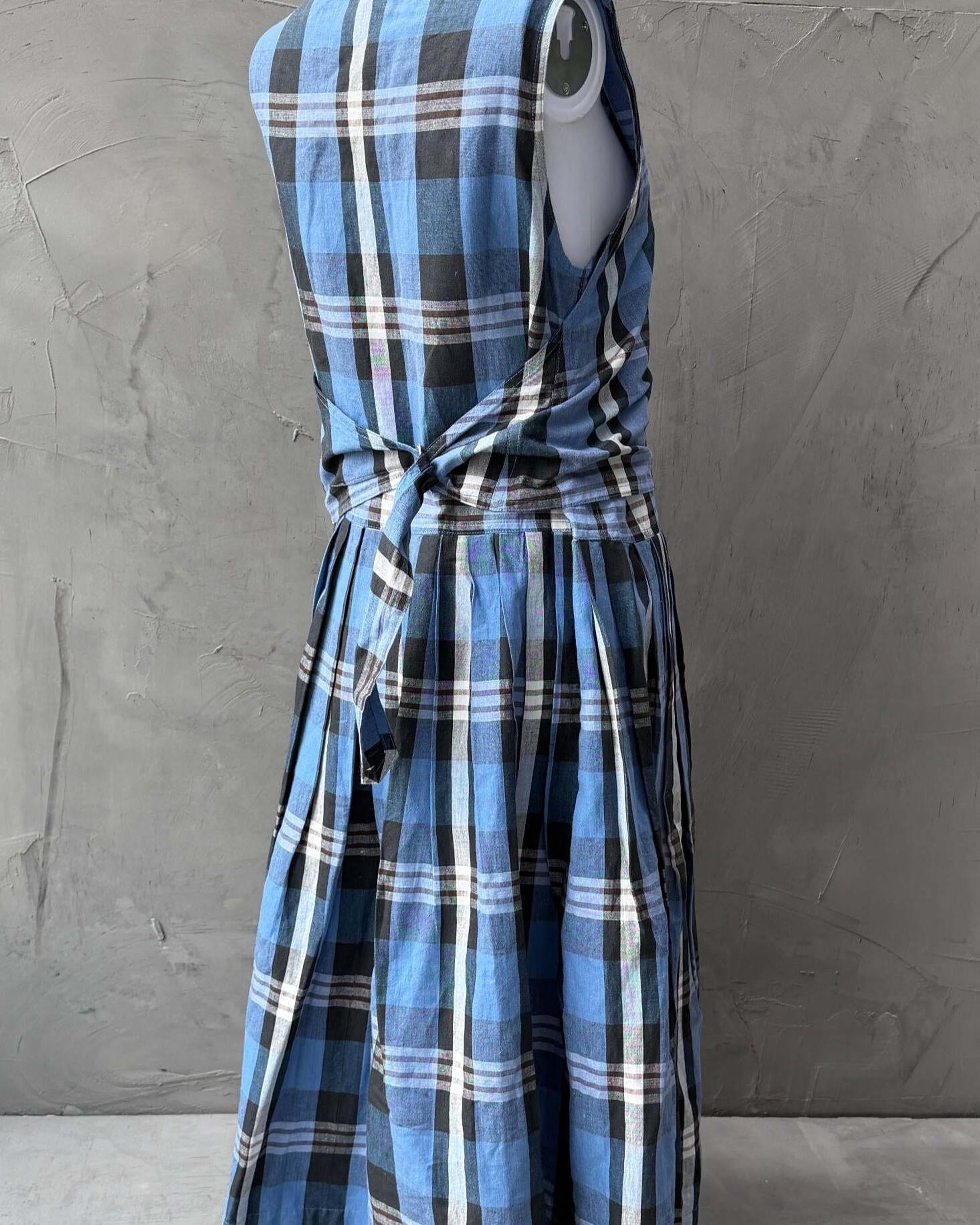 Issey Miyake IS Checkered Dress – M-on a concrete background