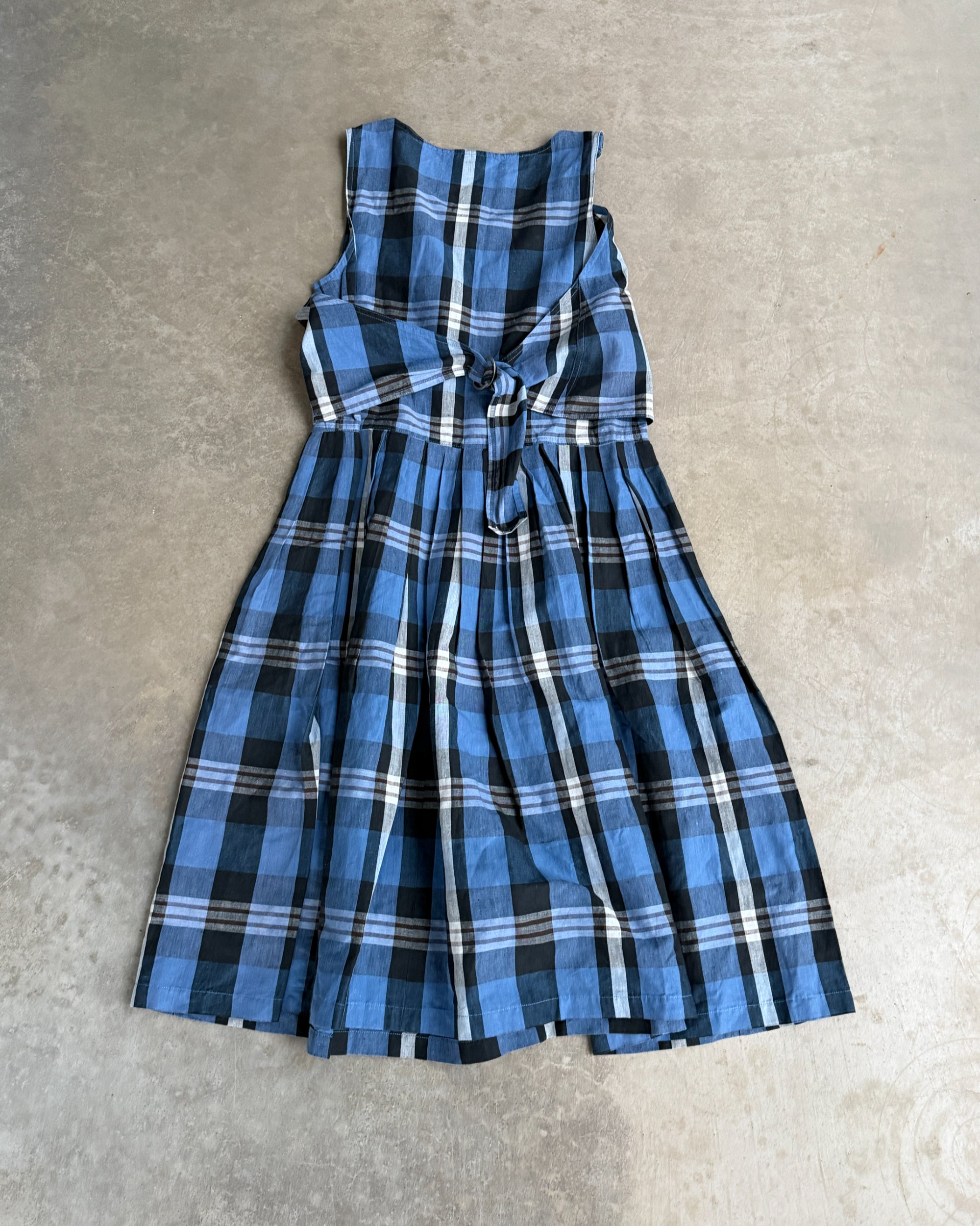 Issey Miyake IS Checkered Dress – M-on a concrete background