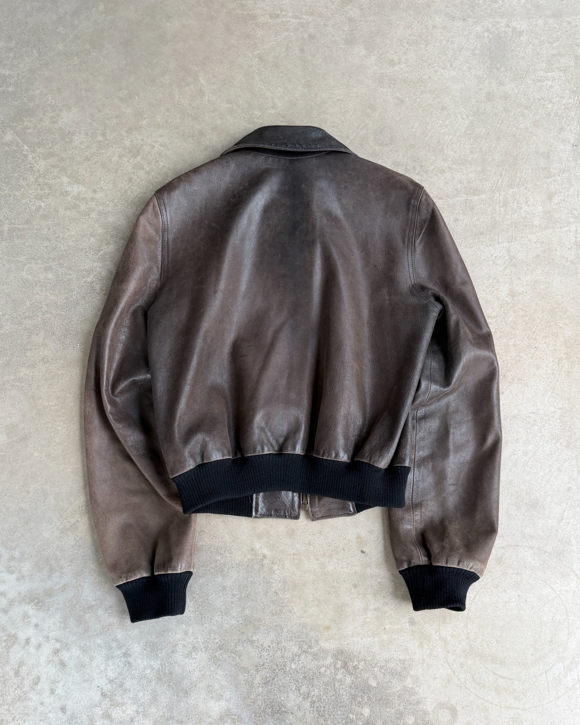 Celine Early 2000s Sheep Leather Bomber Jacket – S-on a concrete background