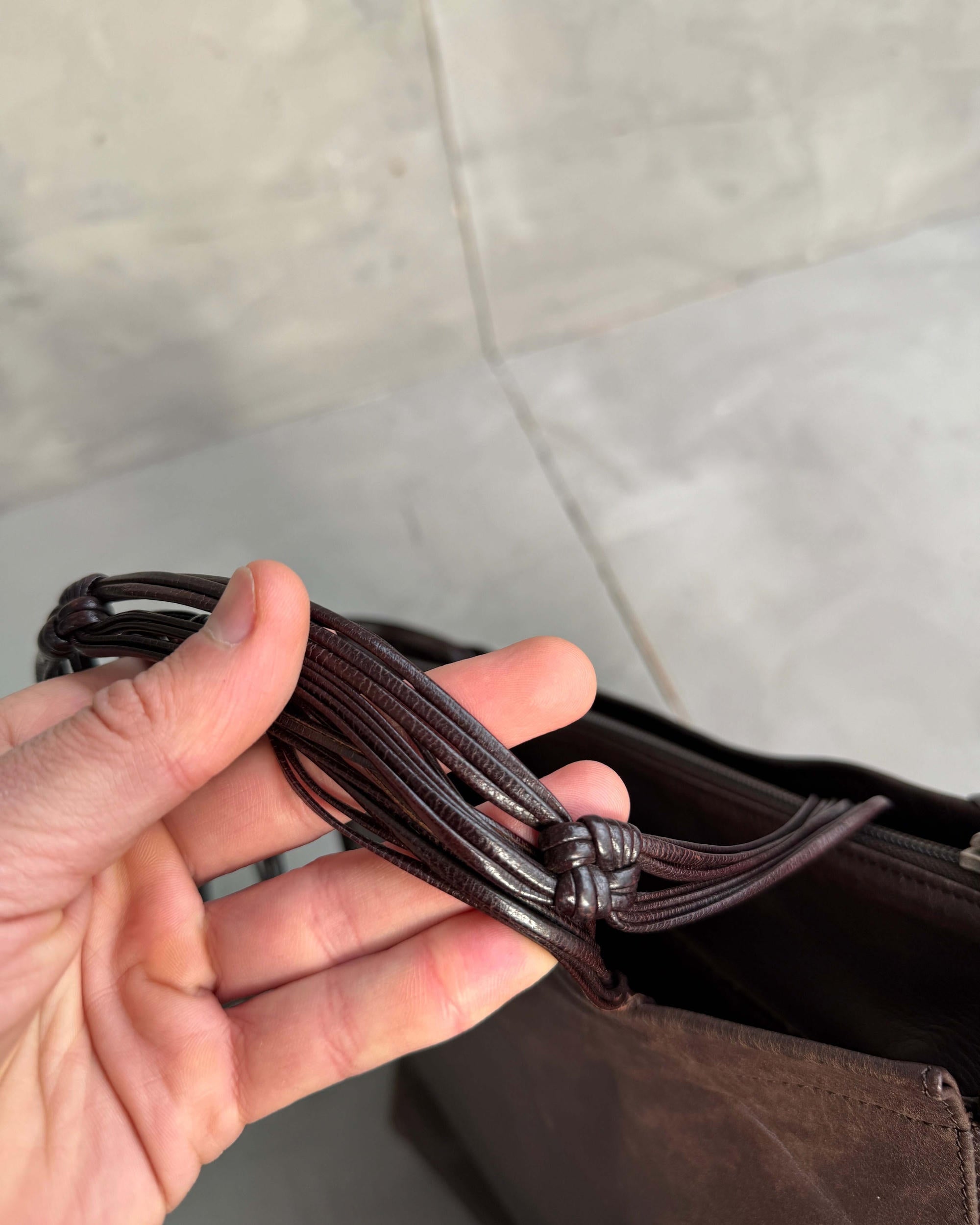 Stephane Kellan Leather Tote Bag-on a concrete background