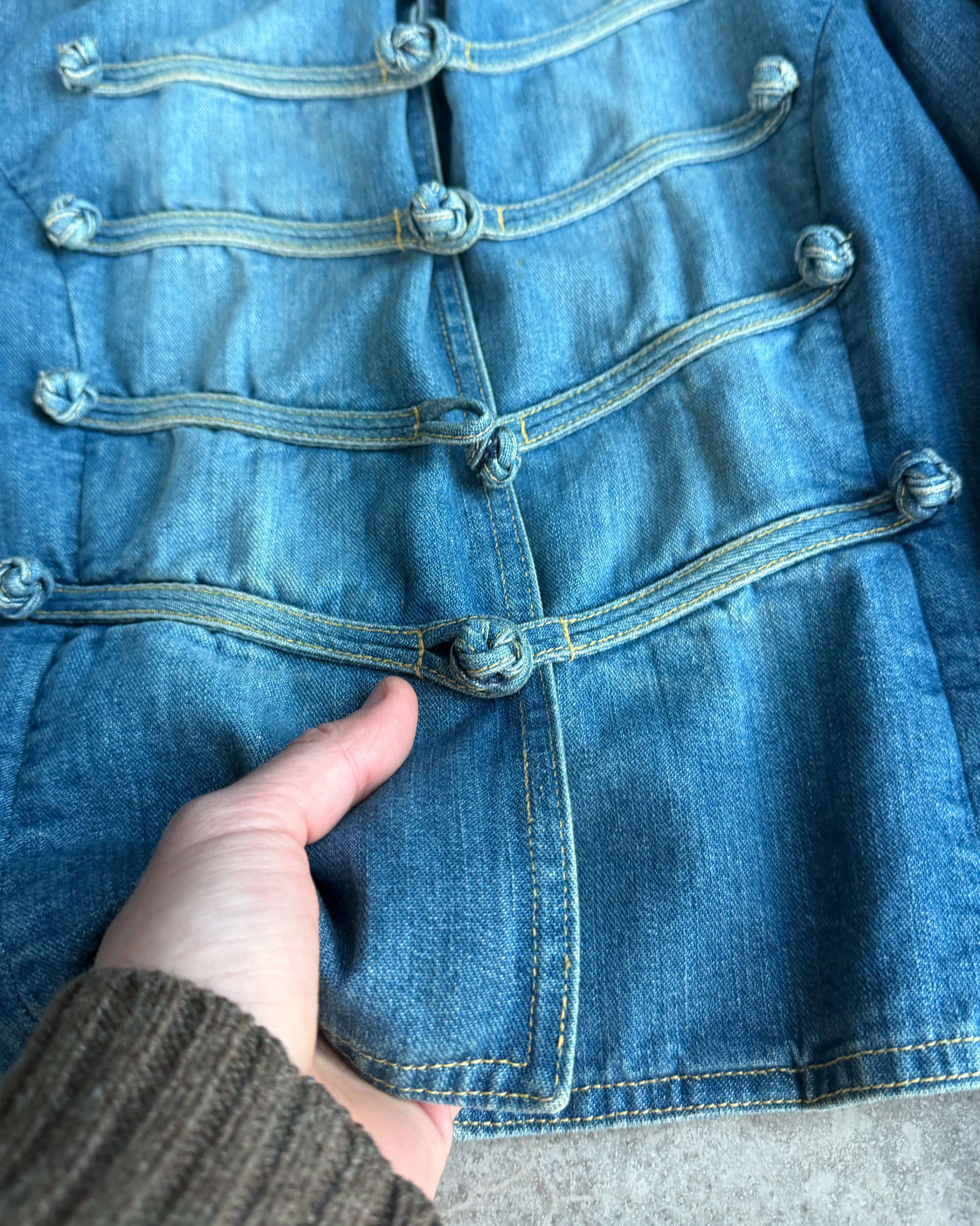 See by Chloé Hussar Denim Jacket – L-on a concrete background