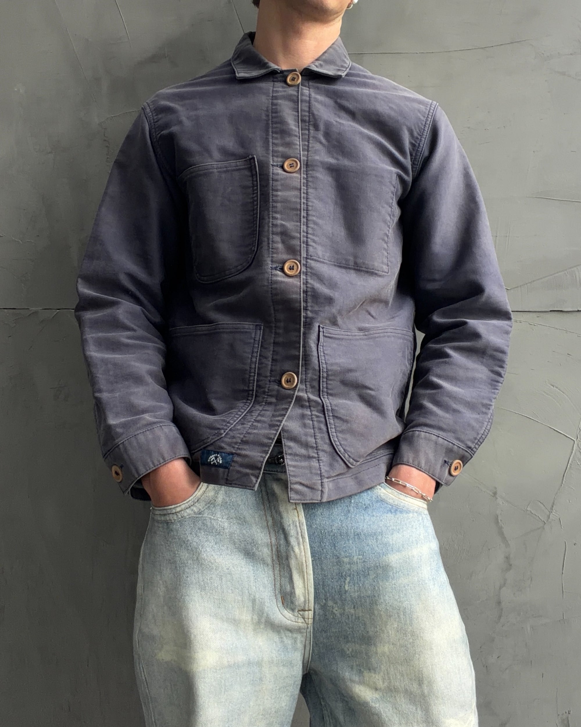 Bleu de Paname French Workwear Jacket – M-on a concrete background