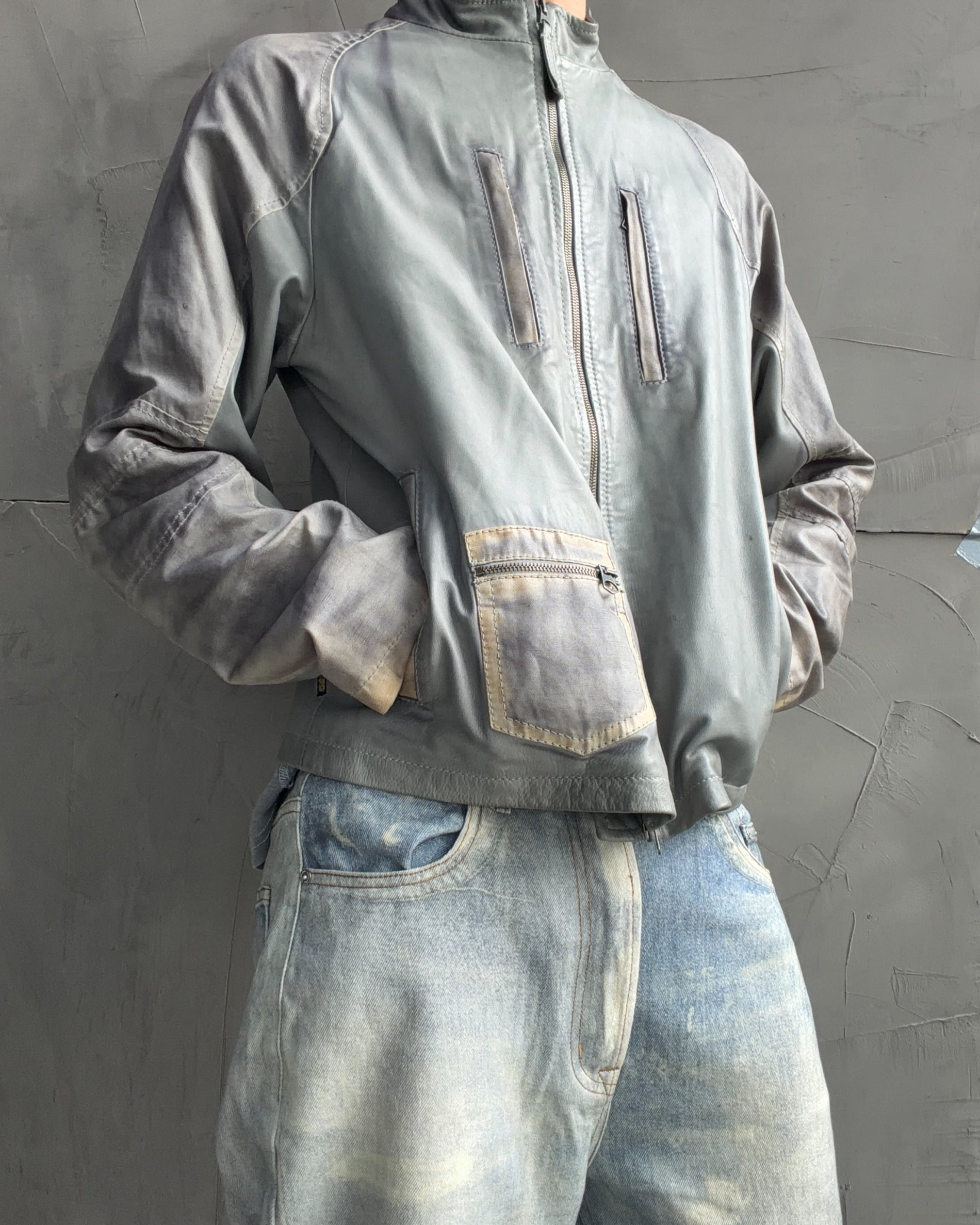 Armani Jeans Distressed Leather Jacket – L-on a concrete background