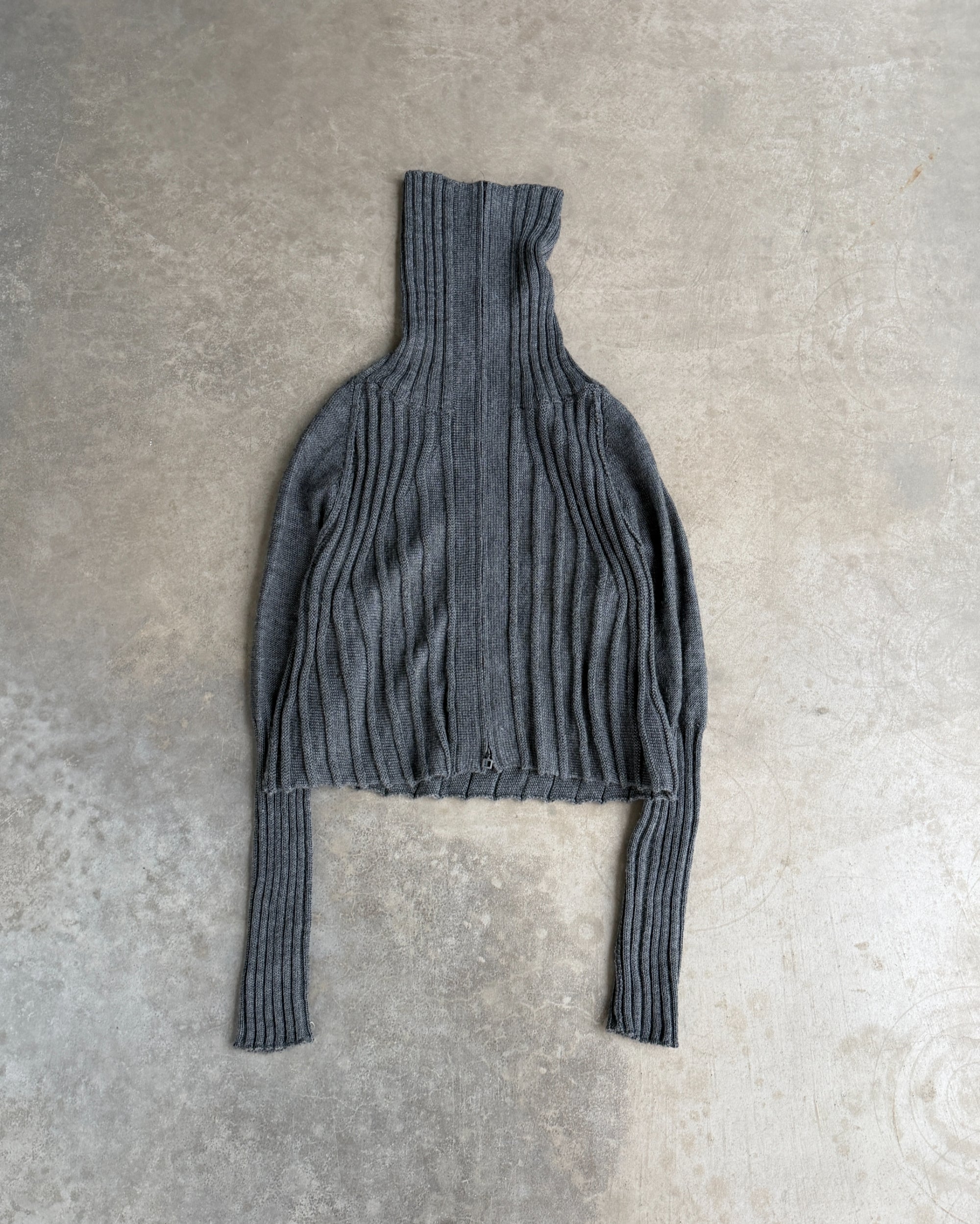 Sarah Pacini Zip-Down Cardigan – One Size-on a concrete background