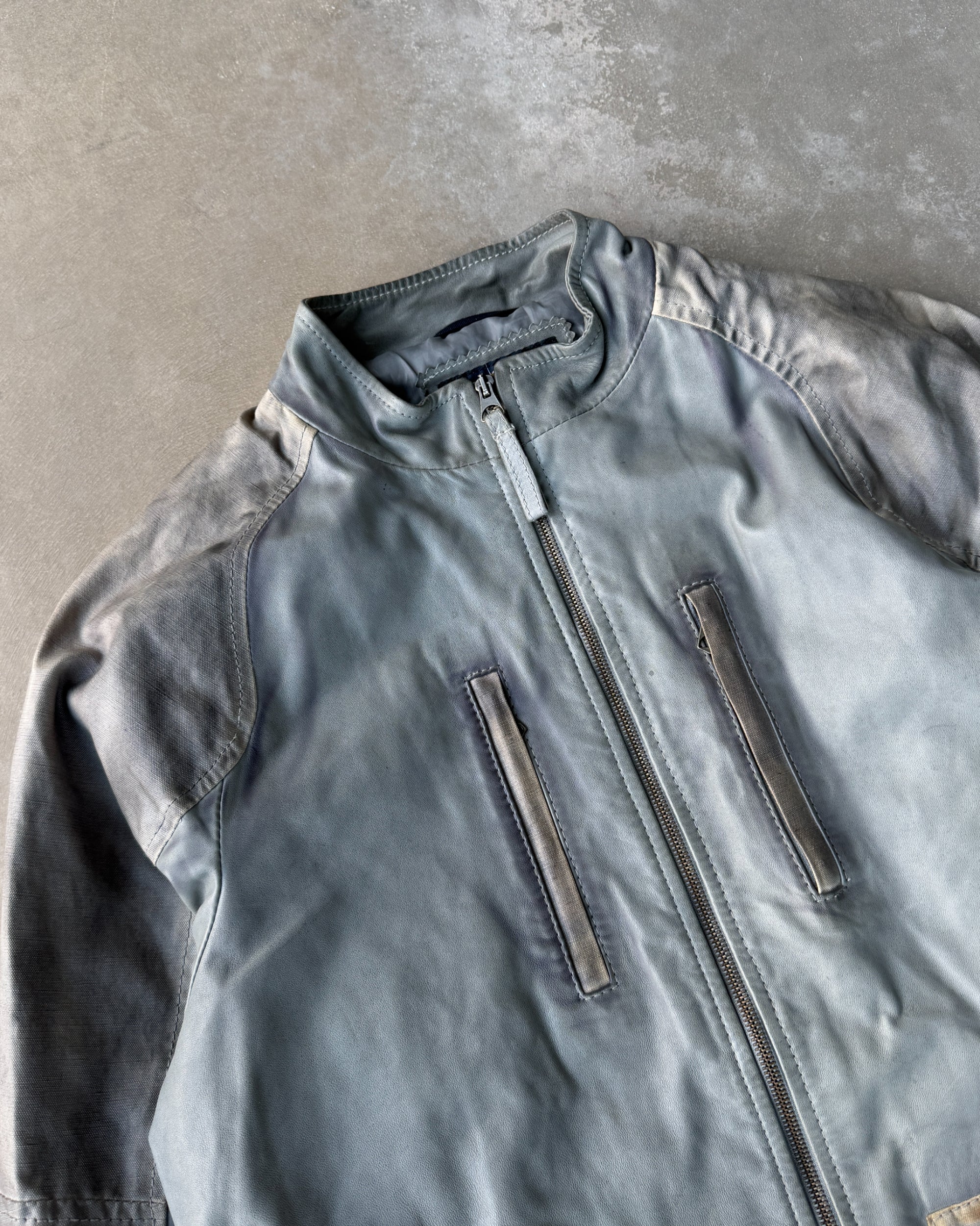 Armani Jeans Distressed Leather Jacket – L-on a concrete background