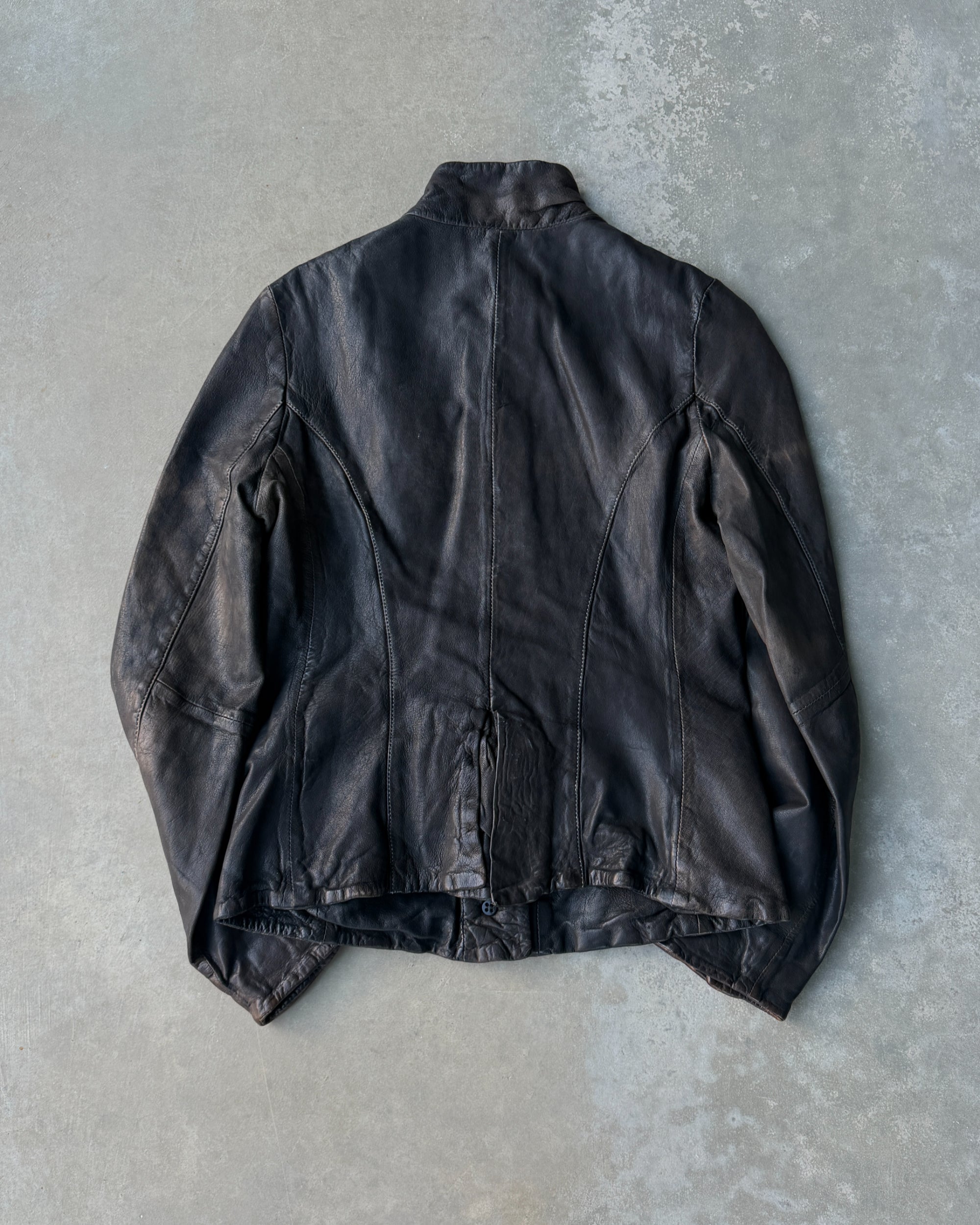 AllSaints 1990s Button-Up Leather Jacket – M-on a concrete background