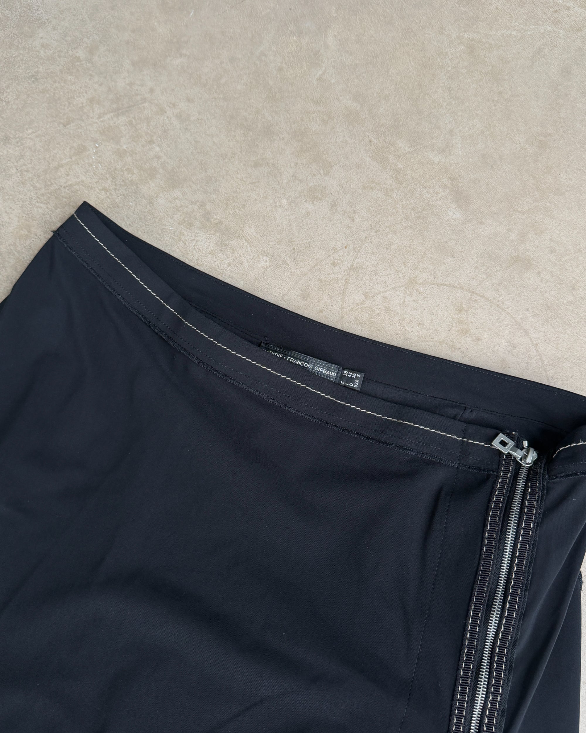 Marithé + François Girbaud Asymmetric Maxi Skirt – S-on a concrete background