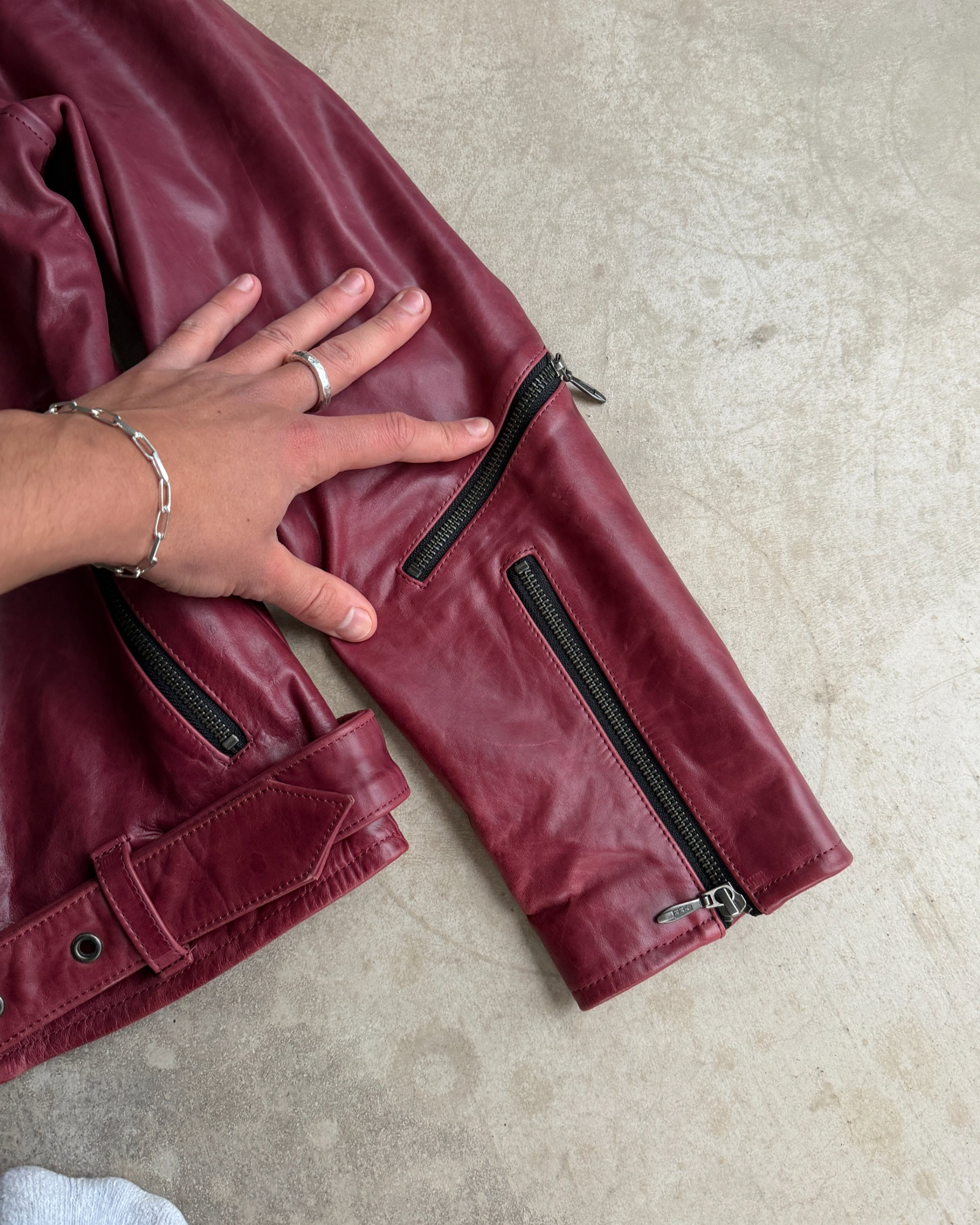 Scheffen Red Horse Leather Biker Jacket – L-on a concrete background