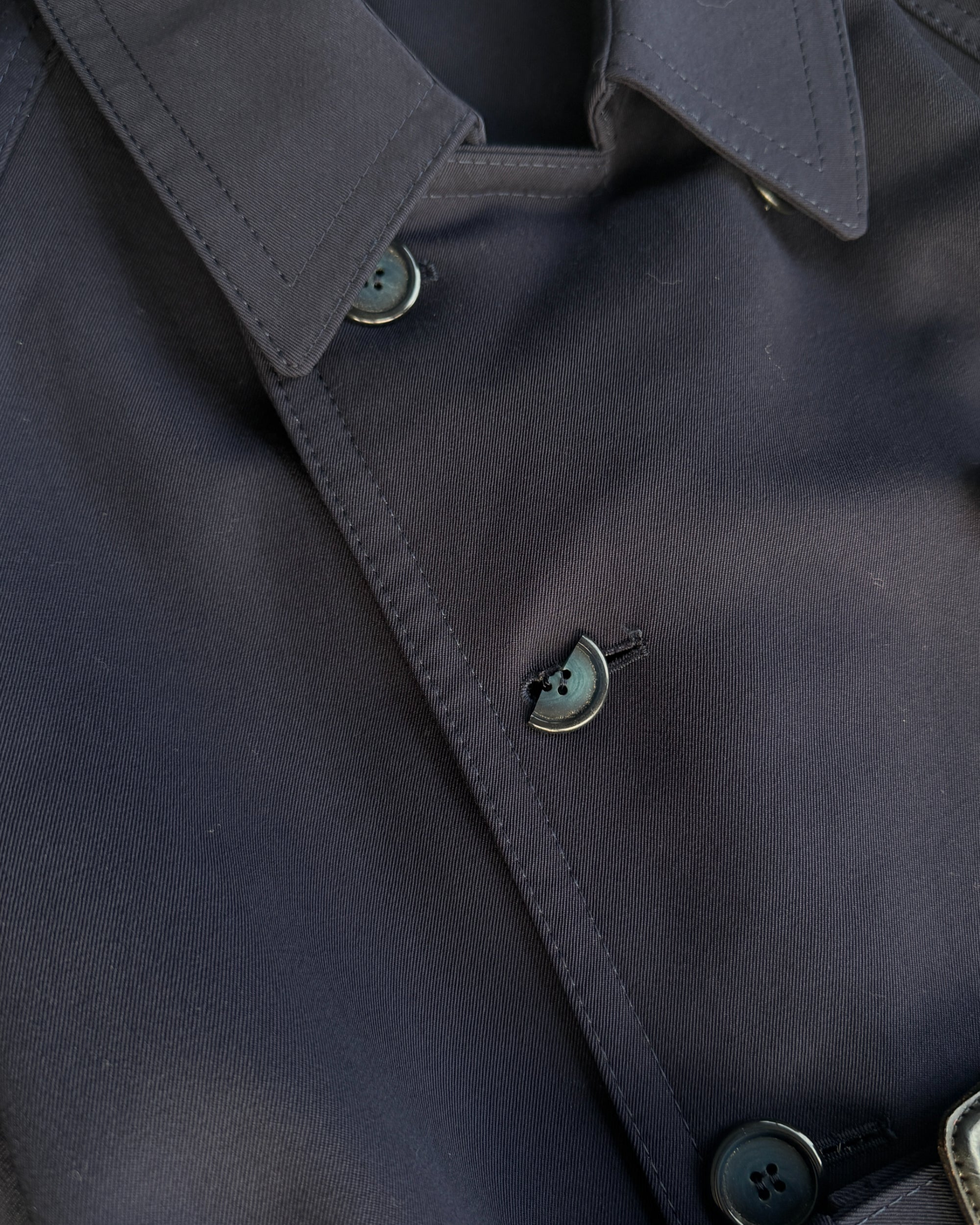 Yves Saint Laurent Wool Double Breasted Mac Coat – M-on a concrete background
