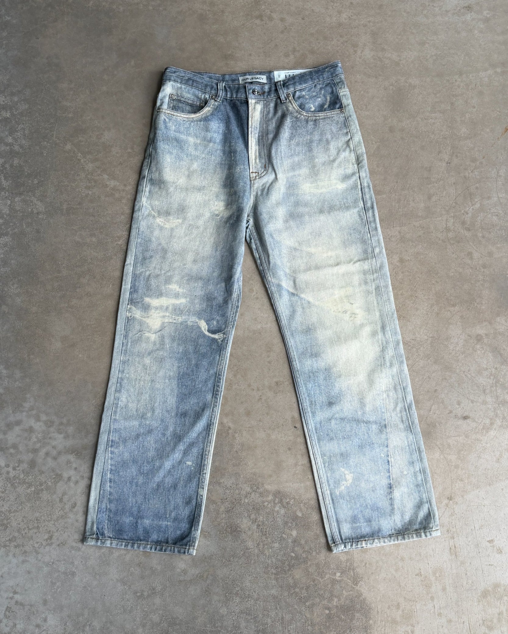 Our Legacy Third Cut Digital Print Distressed Denim Jeans – W30–32-on a concrete background