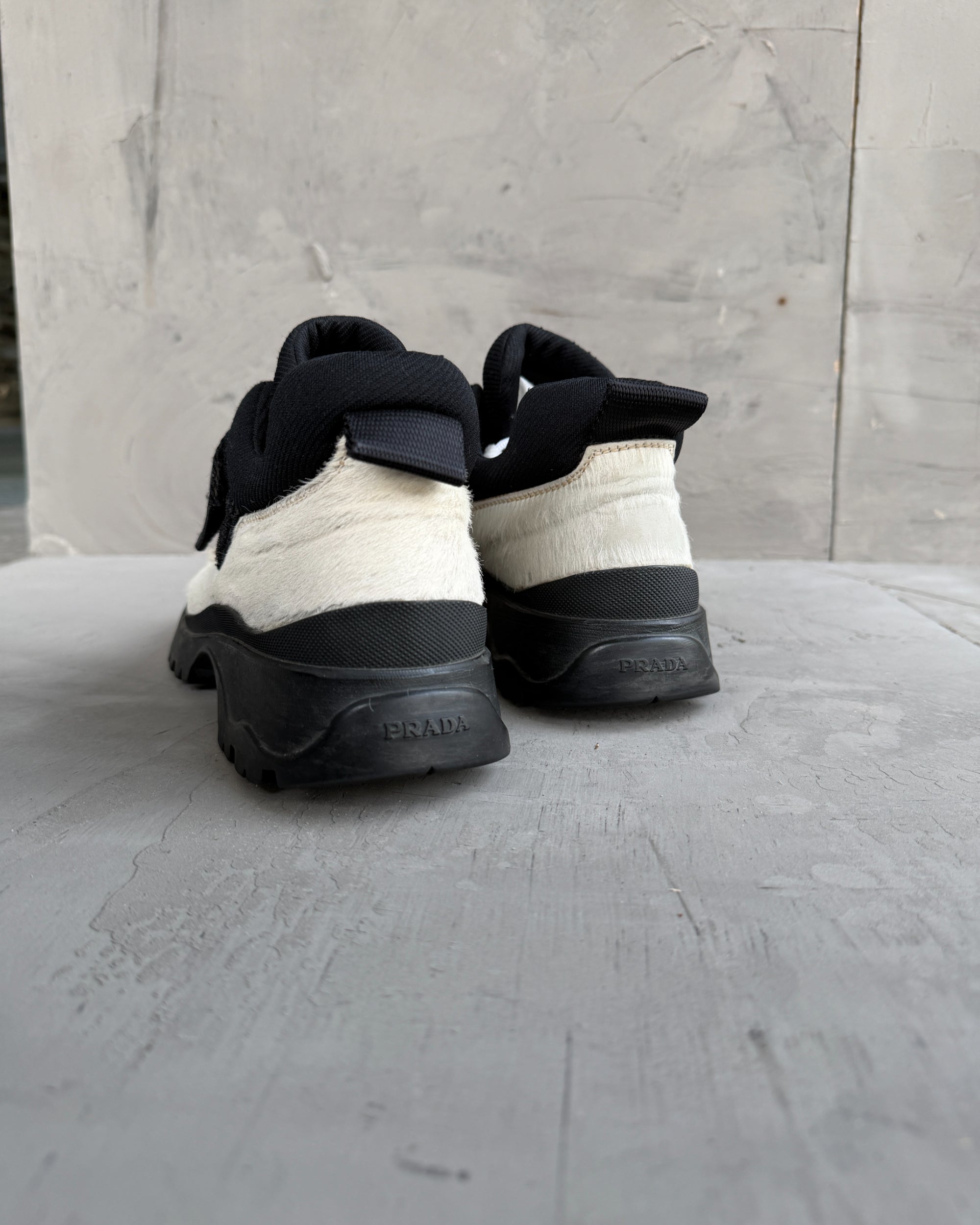Prada FW99 Fur Vibram Heel Derbys – EU 38-on a concrete background