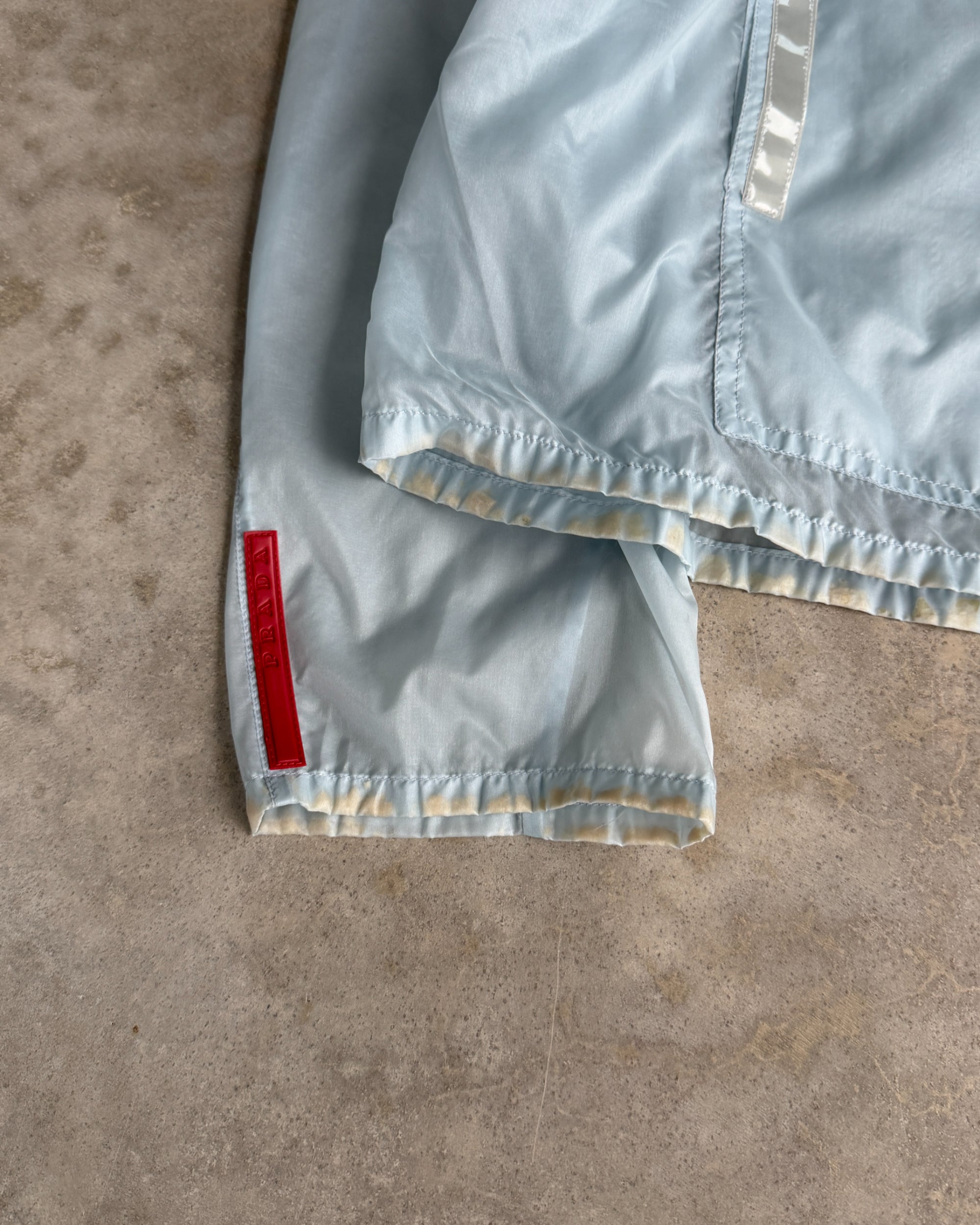 Prada SS99 Transparent Nylon Jacket – XL-on a concrete background