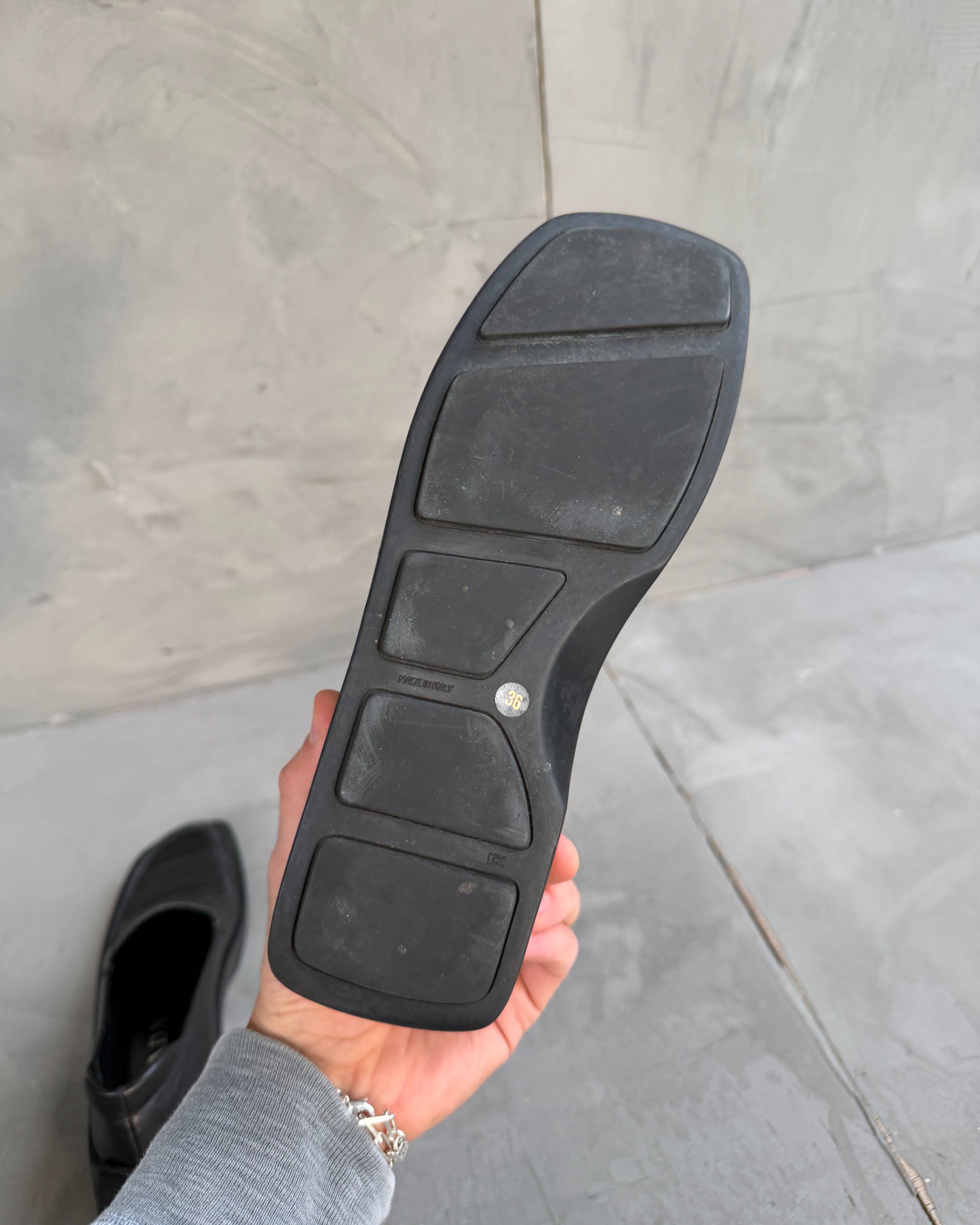 Prada FW99 Leather Extended Sole Loafers – EU 36-on a concrete background