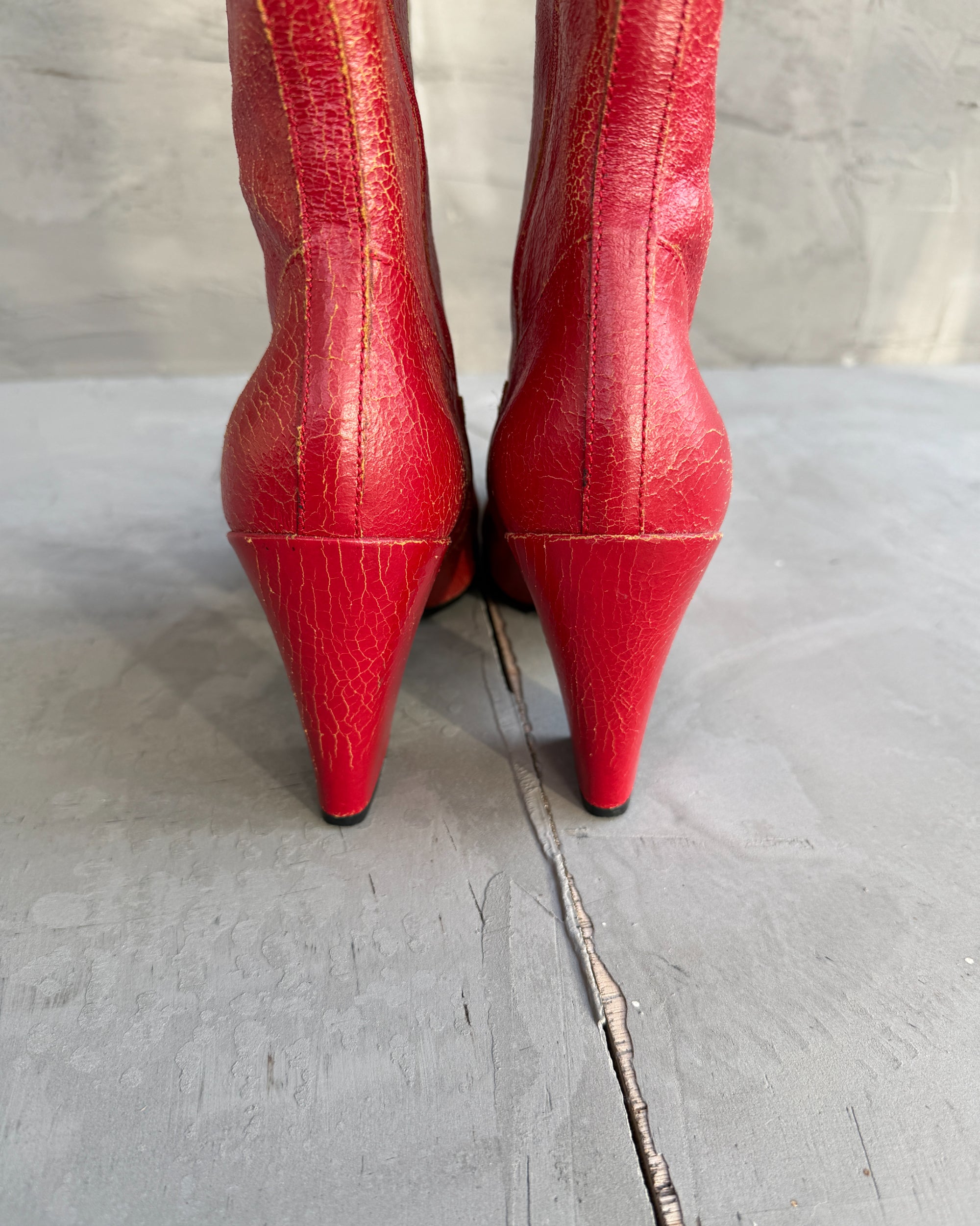 Miu Miu FW01 Cracked Leather Red Lace-Up Boots – EU 38-on a concrete background
