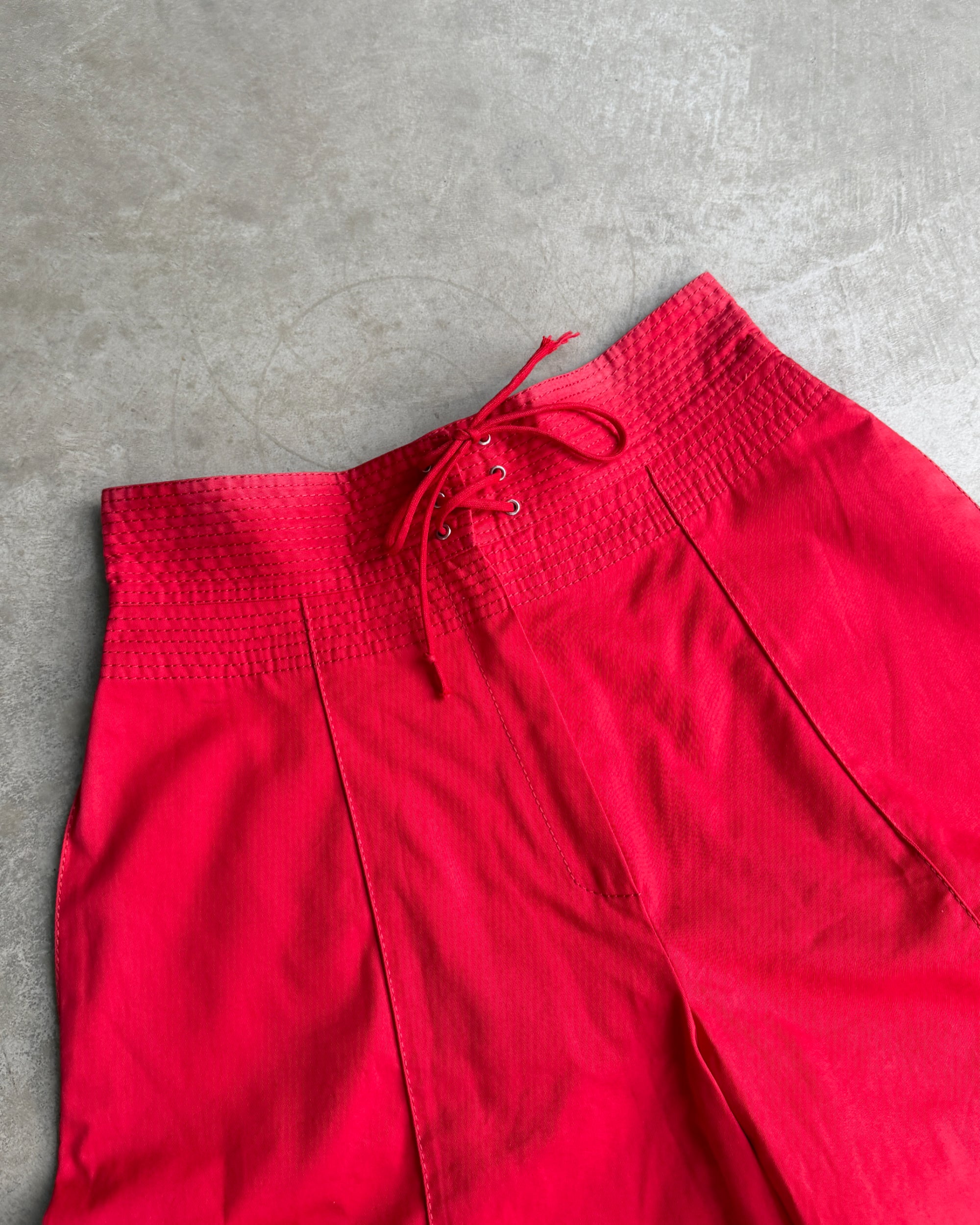 Gianfranco Ferre Cotton Shorts – S-on a concrete background