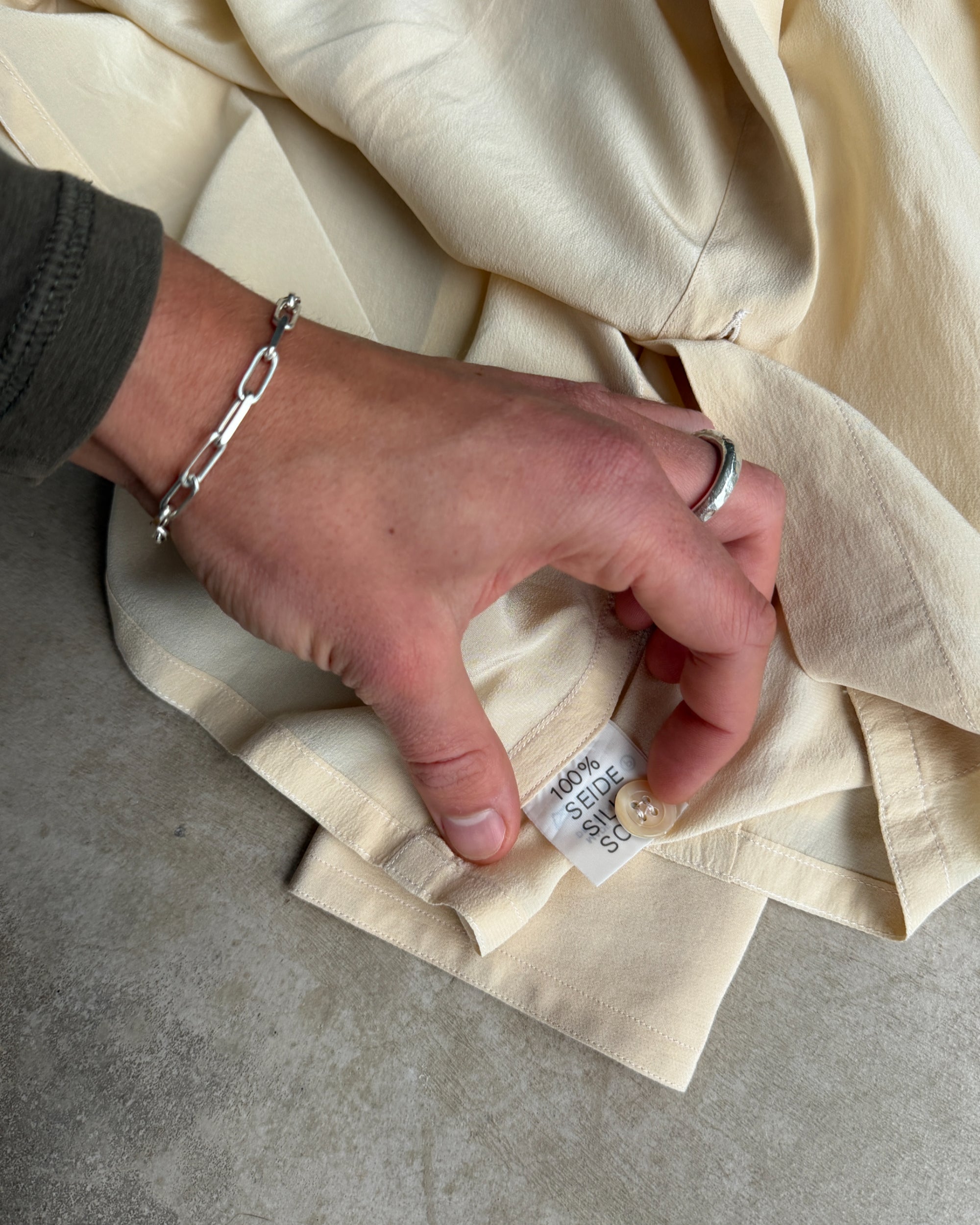 Jil Sander Silk Shirt – S-on a concrete background