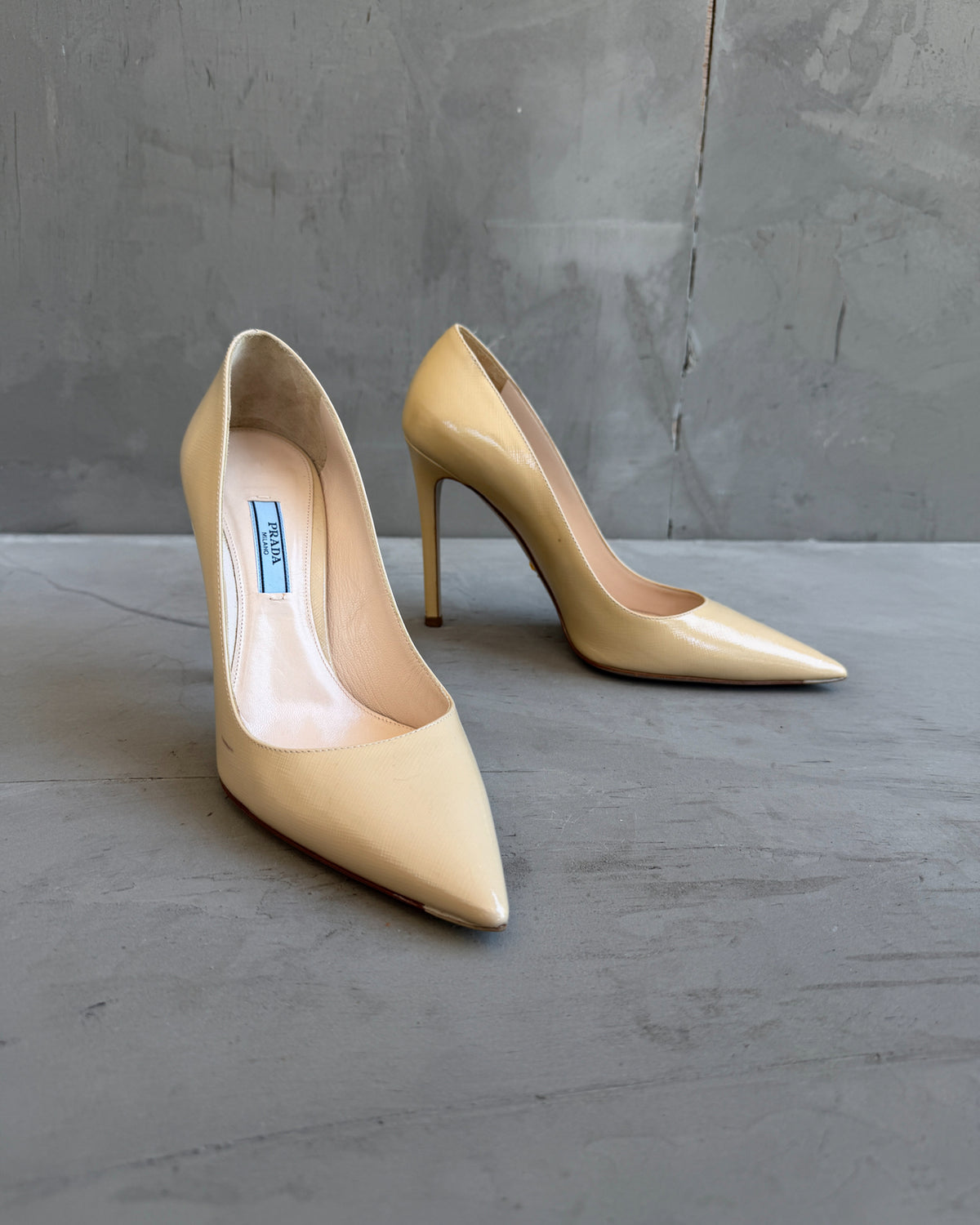 Prada Cream Leather High Heels – EU 37.5-on a concrete background