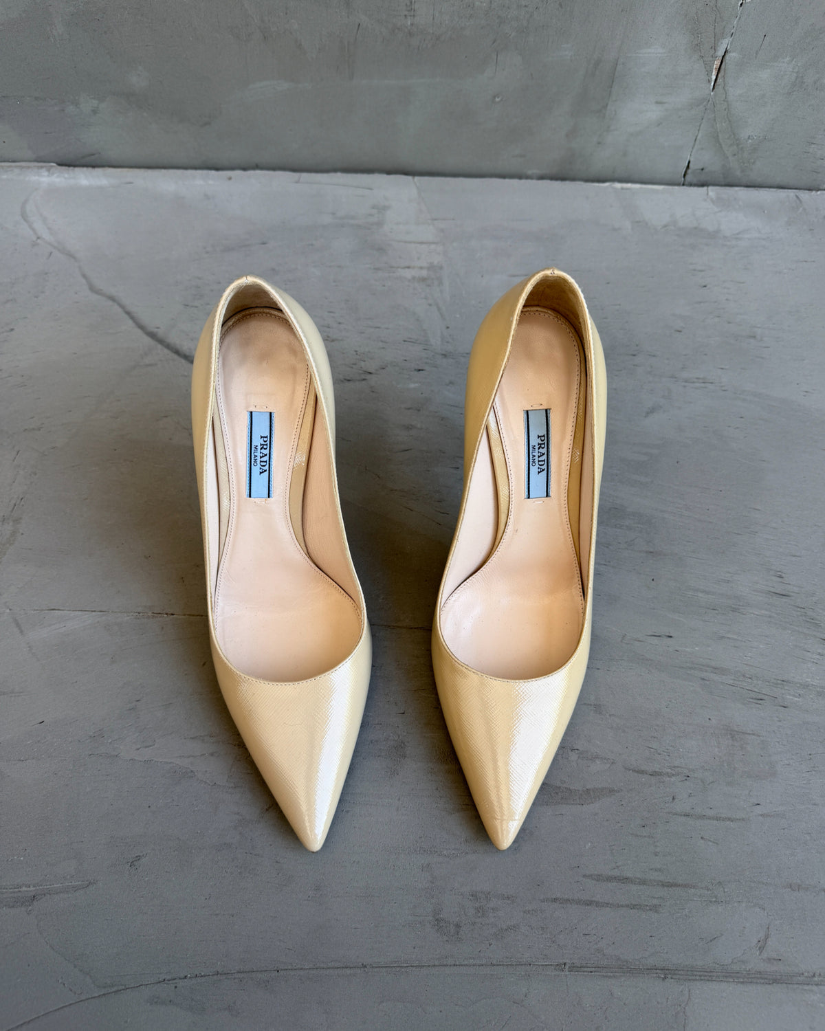 Prada Cream Leather High Heels – EU 37.5-on a concrete background