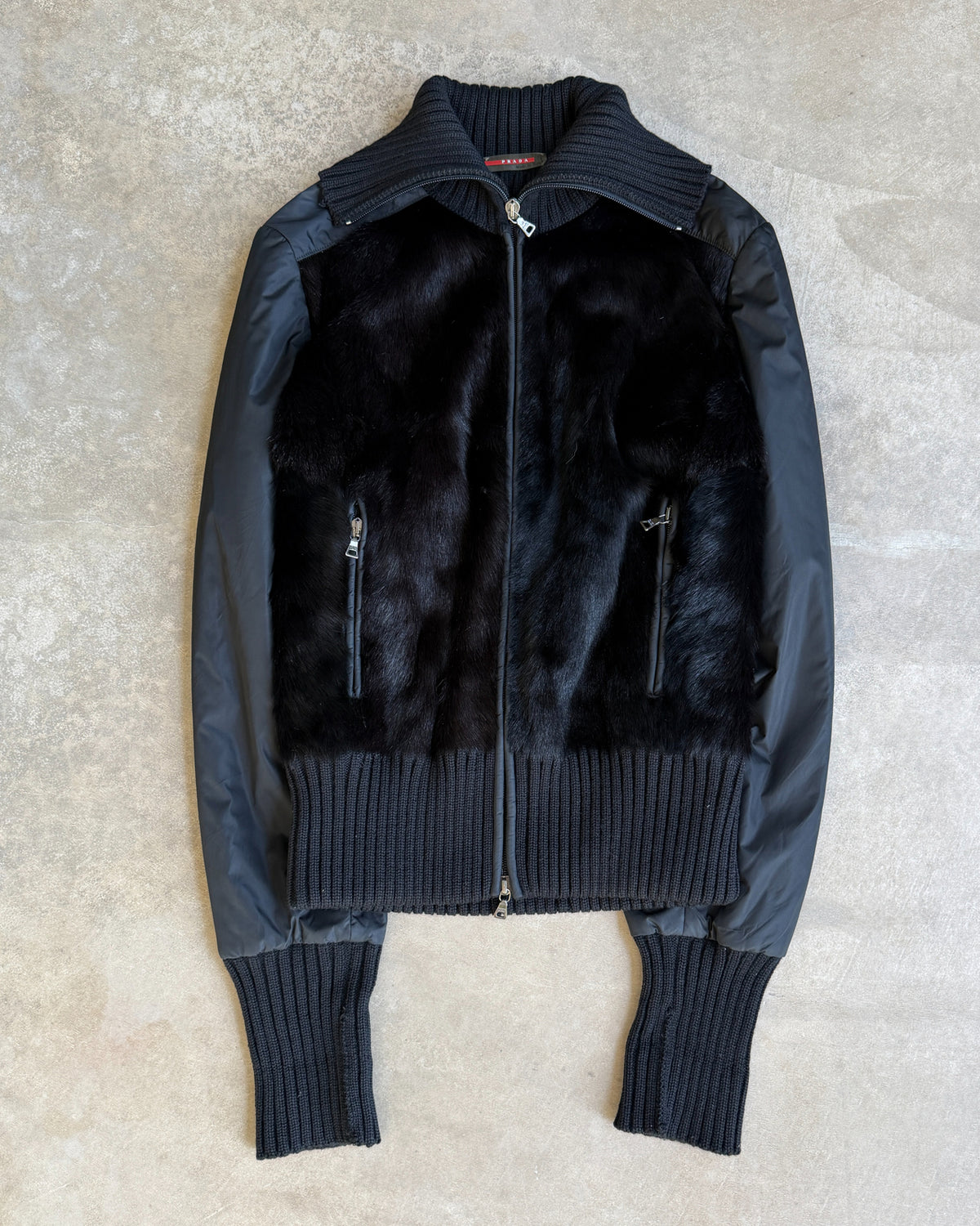 Prada FW1999 Nylon and Fox Fur Jacket – S/M-on a concrete background