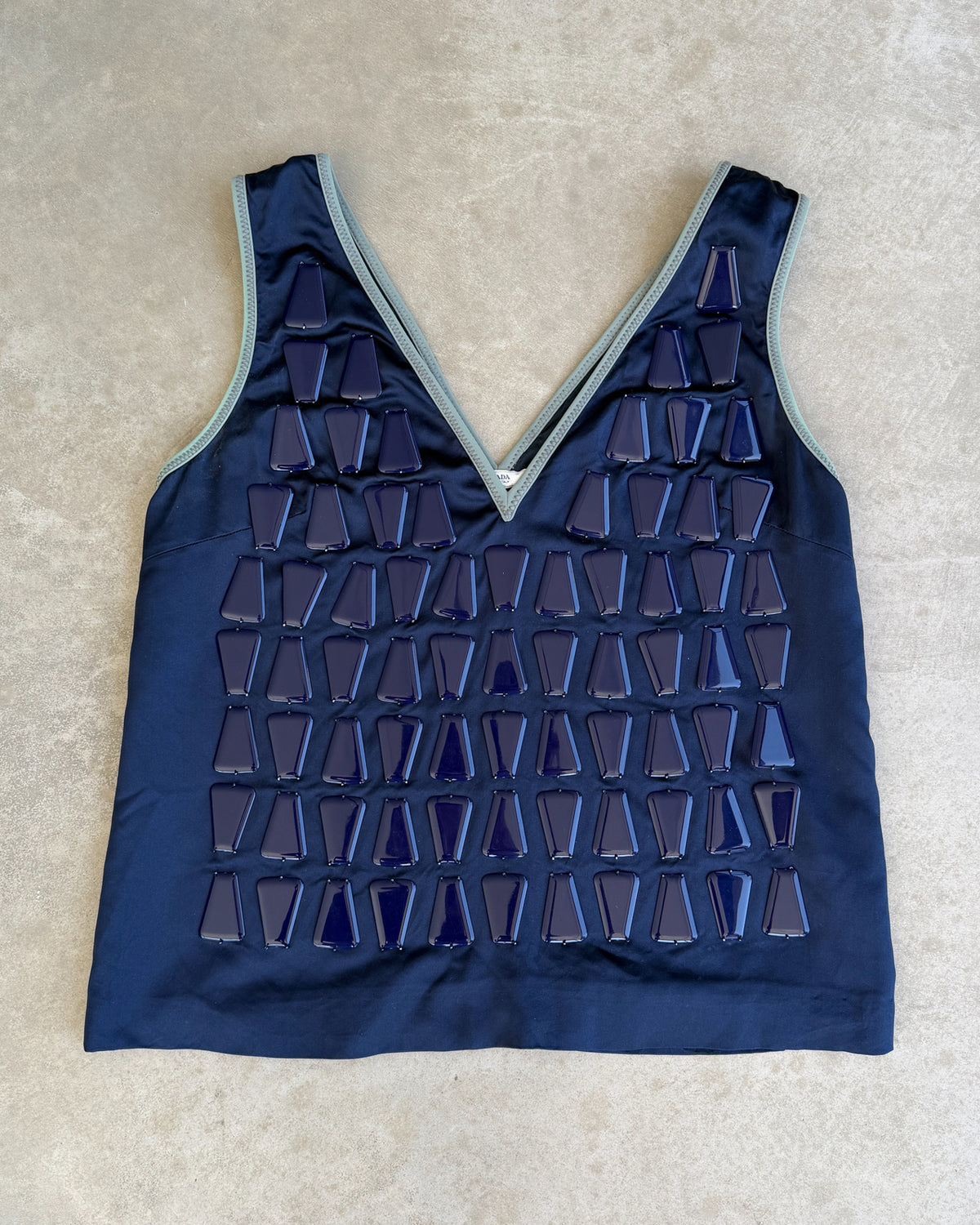 Prada Blue Silk Beaded Vest – S-on a concrete background