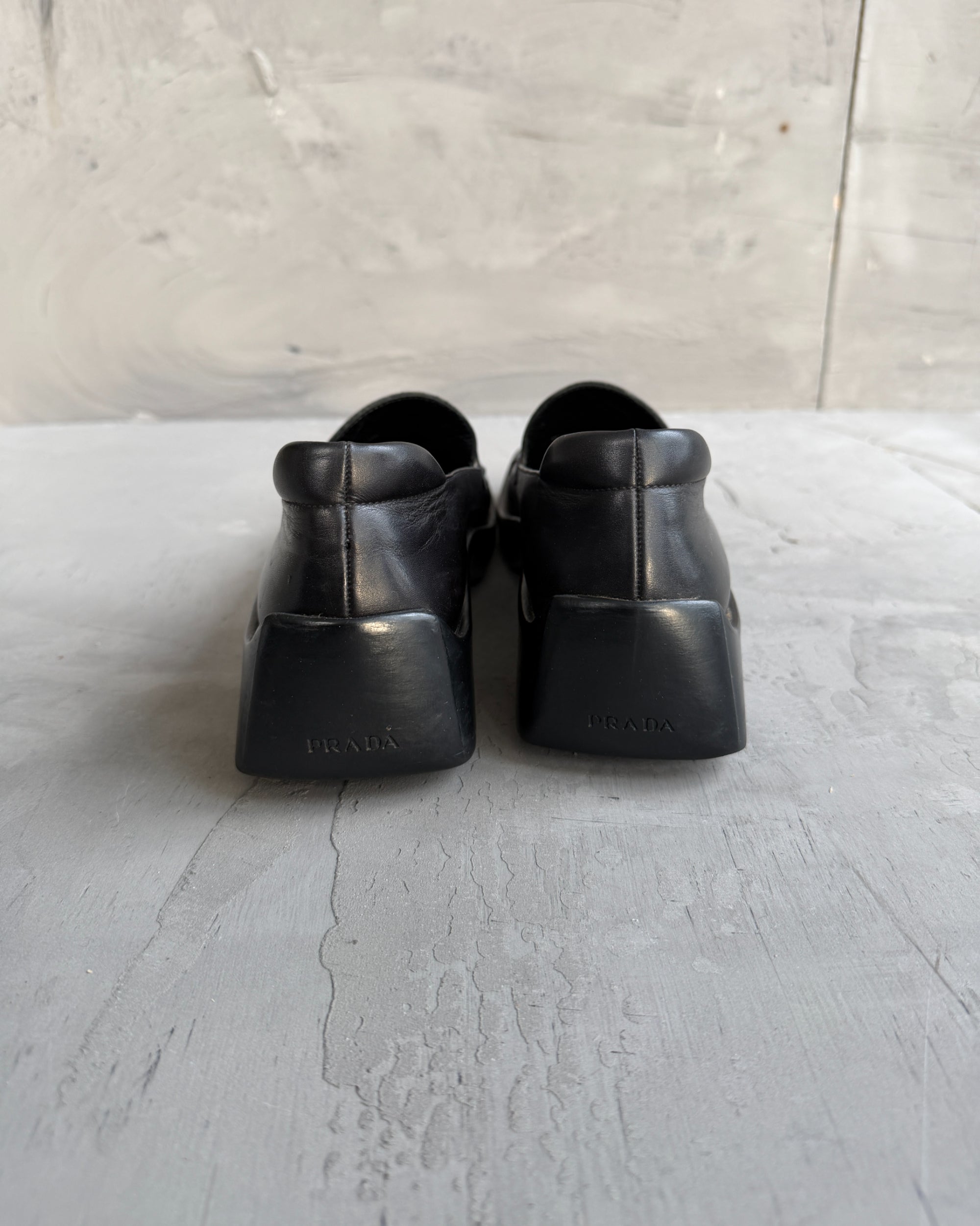 Prada FW99 Leather Extended Sole Loafers – EU 36-on a concrete background