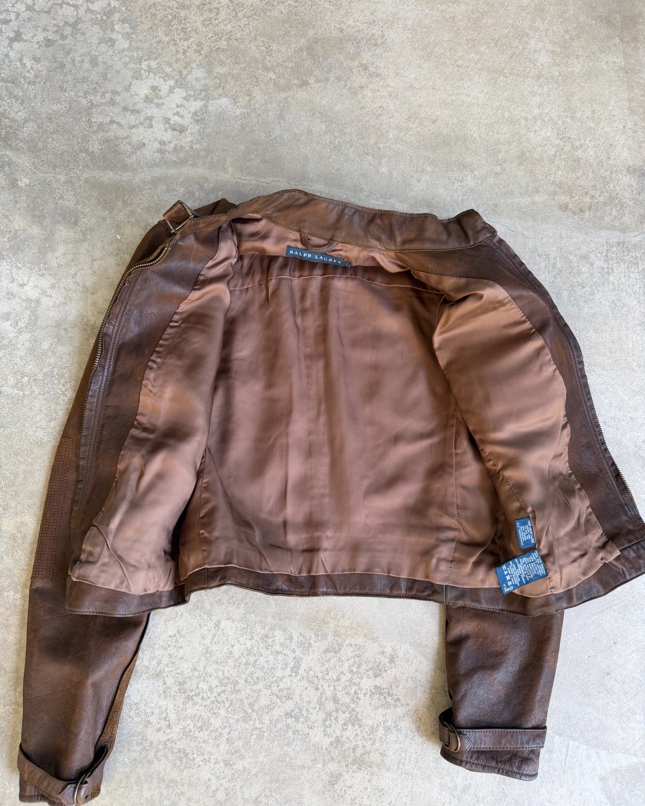 Ralph Lauren Brown Cowhide Leather Jacket – S-on a concrete background