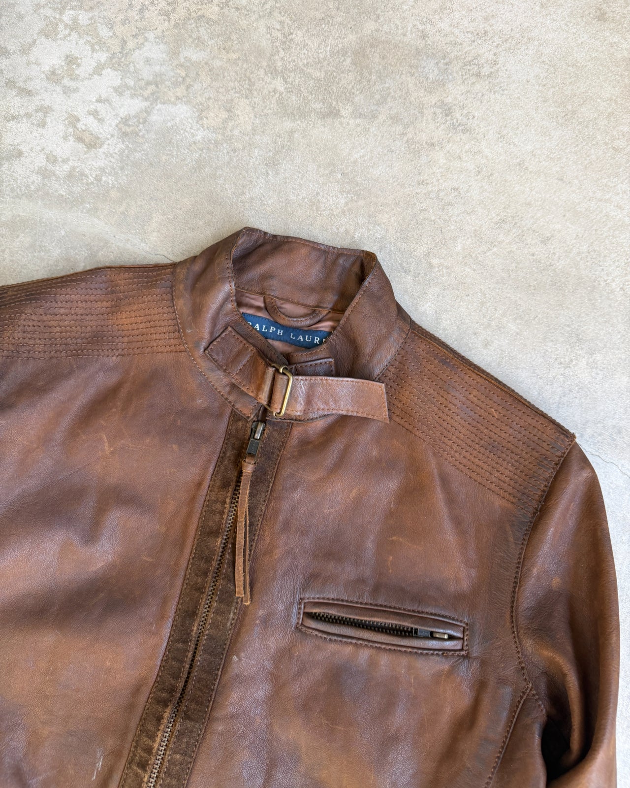 Ralph Lauren Brown Cowhide Leather Jacket – S-on a concrete background
