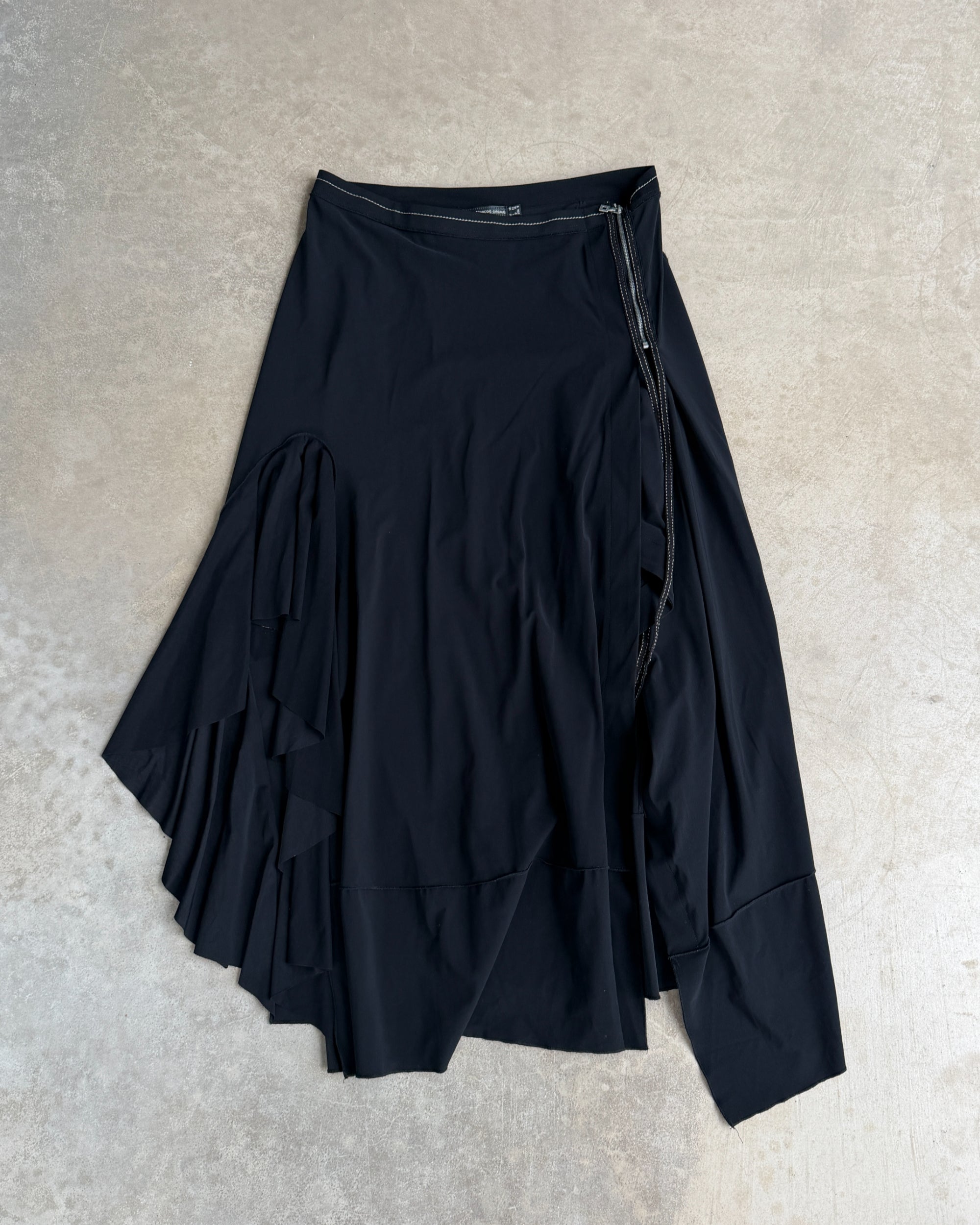 Marithé + François Girbaud Asymmetric Maxi Skirt – S-on a concrete background
