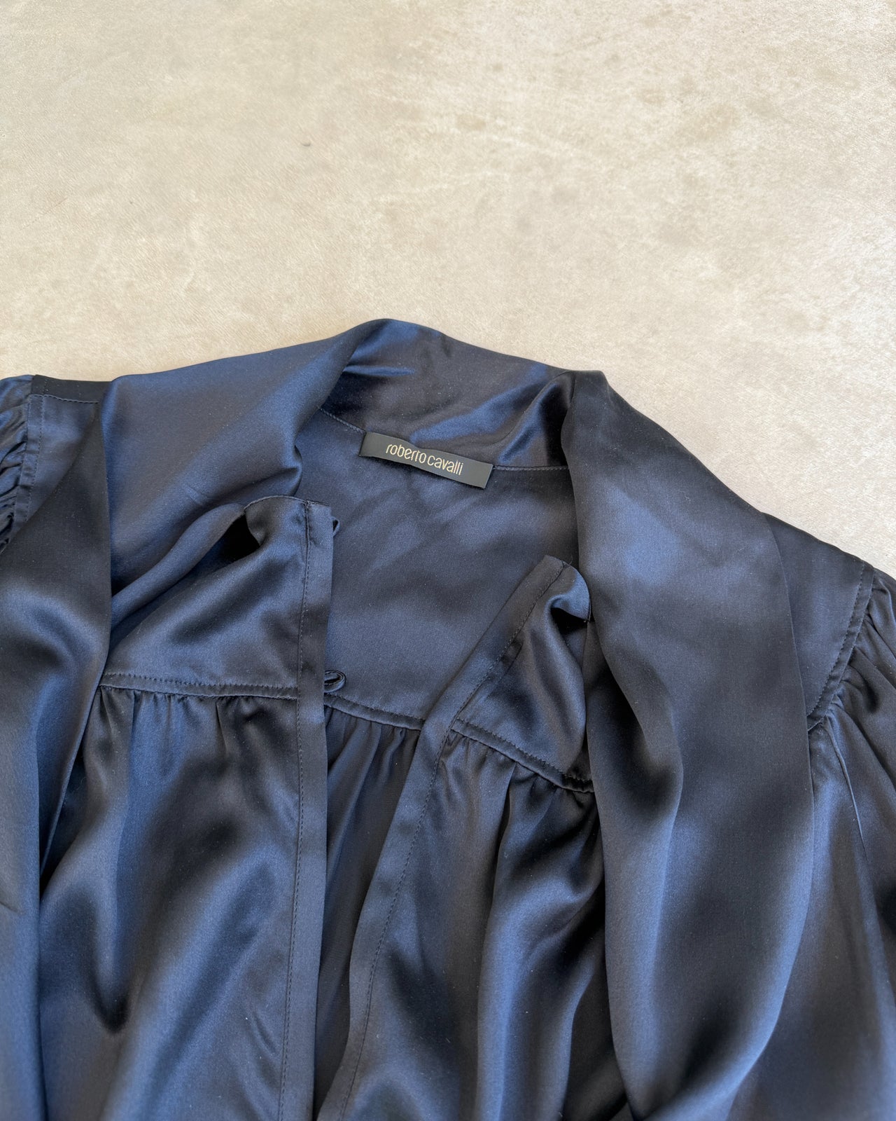 Roberto Cavalli SS2007 Silk Shirt – S-on a concrete background