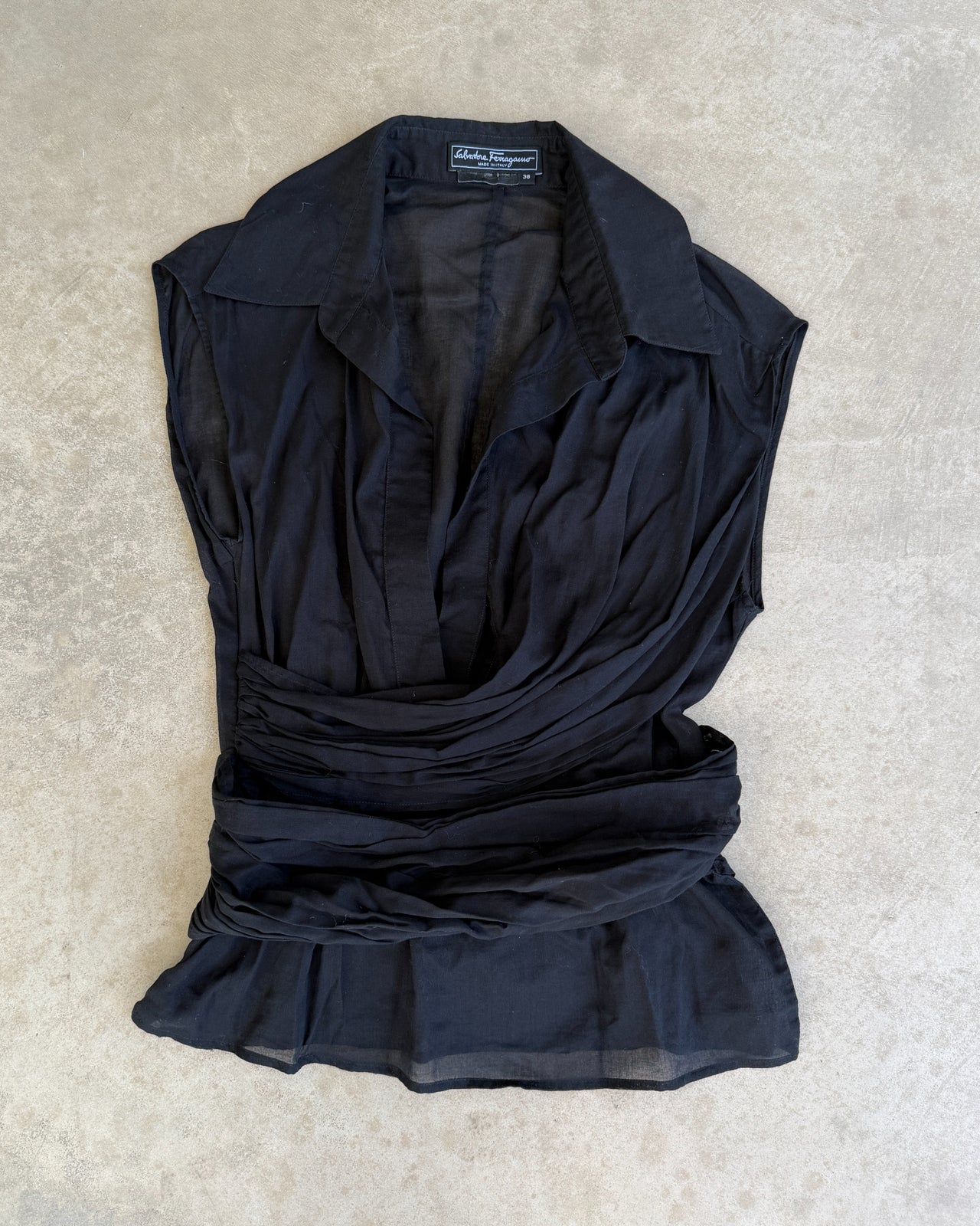 Salvatore Ferragamo Black Cotton Asymmetric Collared Top – S-on a concrete background