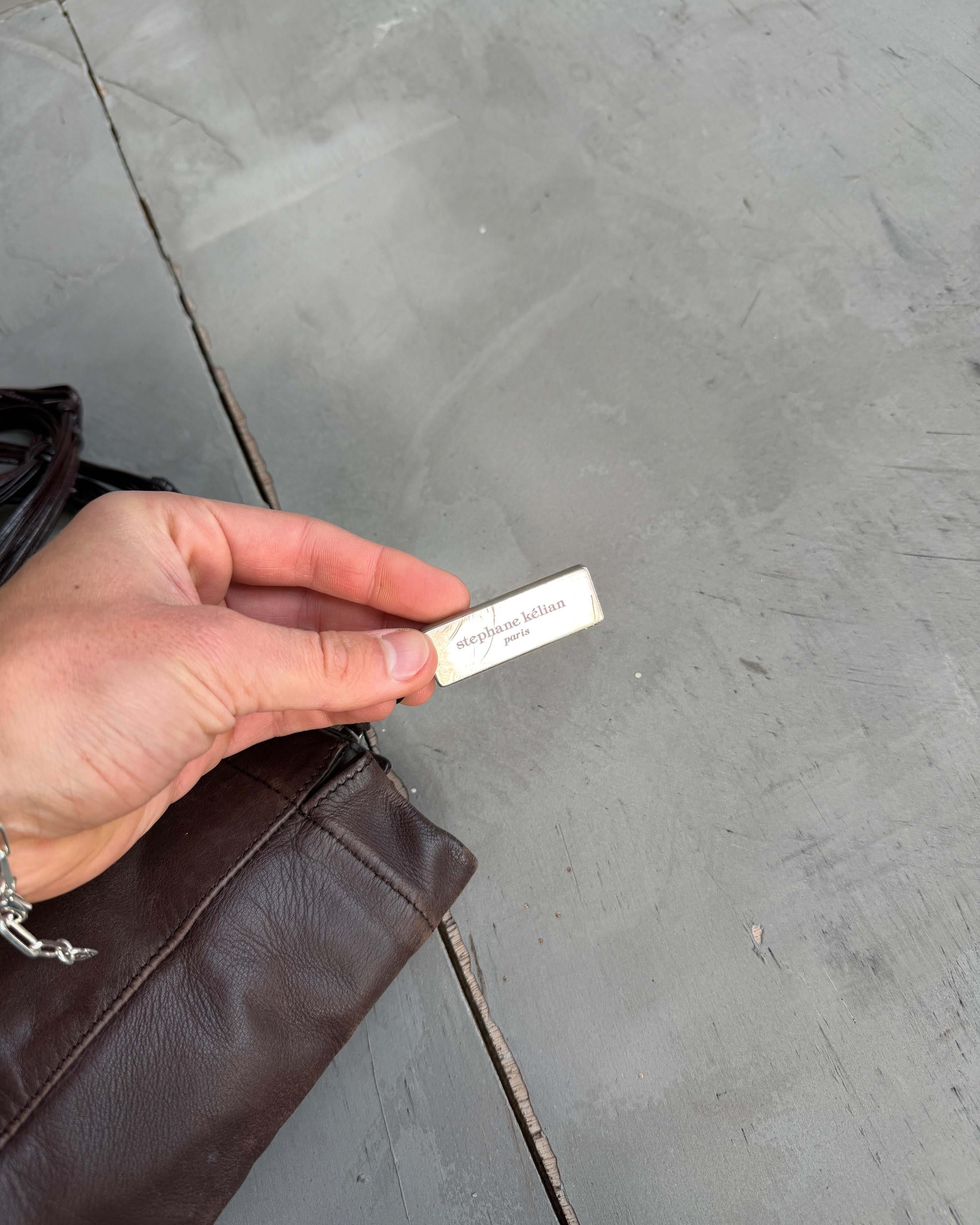 Stephane Kellan Leather Tote Bag-on a concrete background