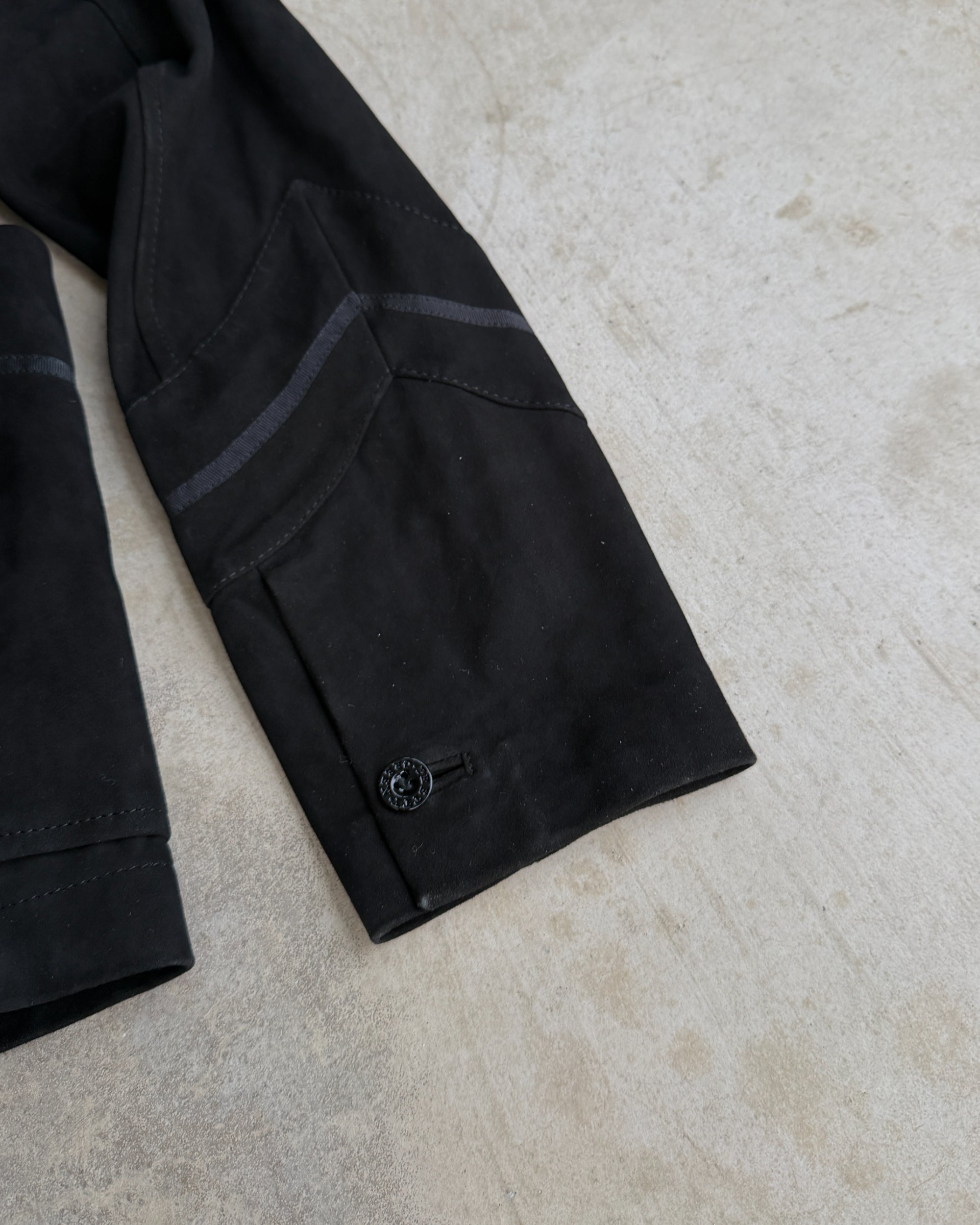 Pretty Green Military Button-Up Suede Jacket – S–M-on a concrete background