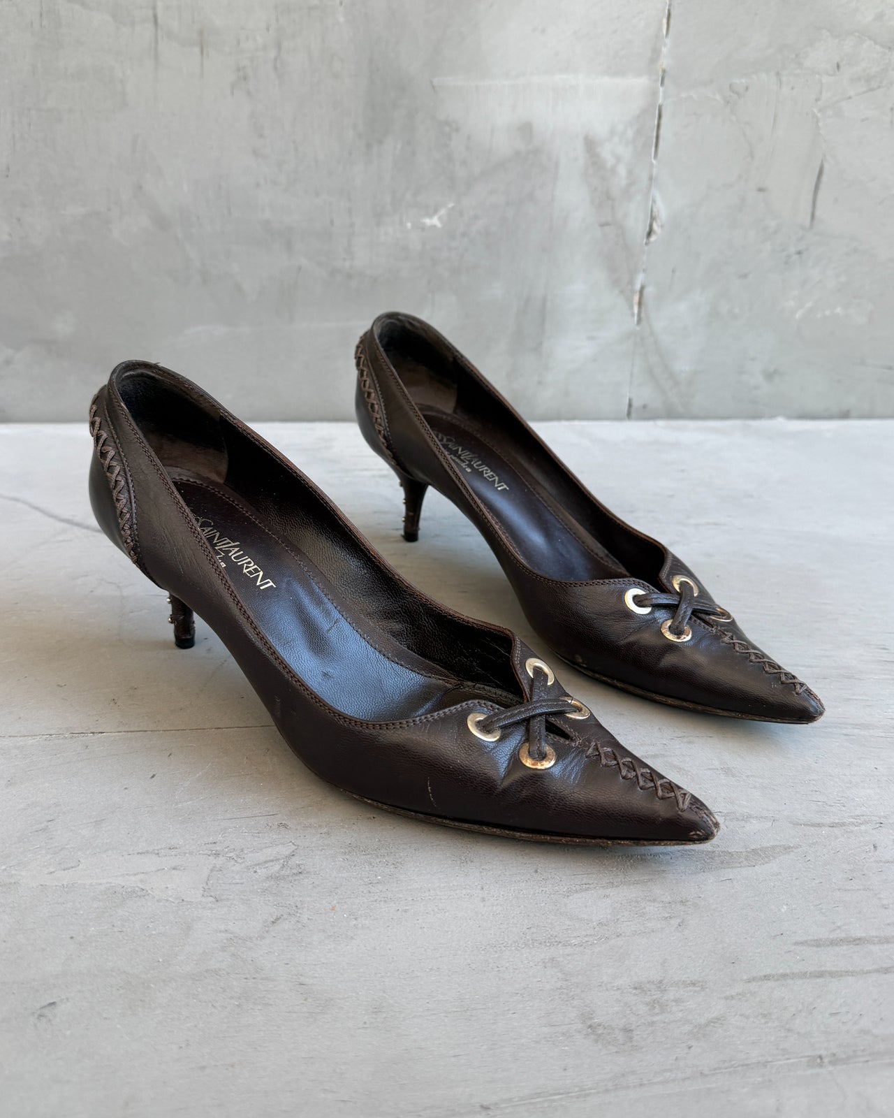 Yves Saint Laurent Rive Gauche Brown Leather Heels – EU 38-on a concrete background