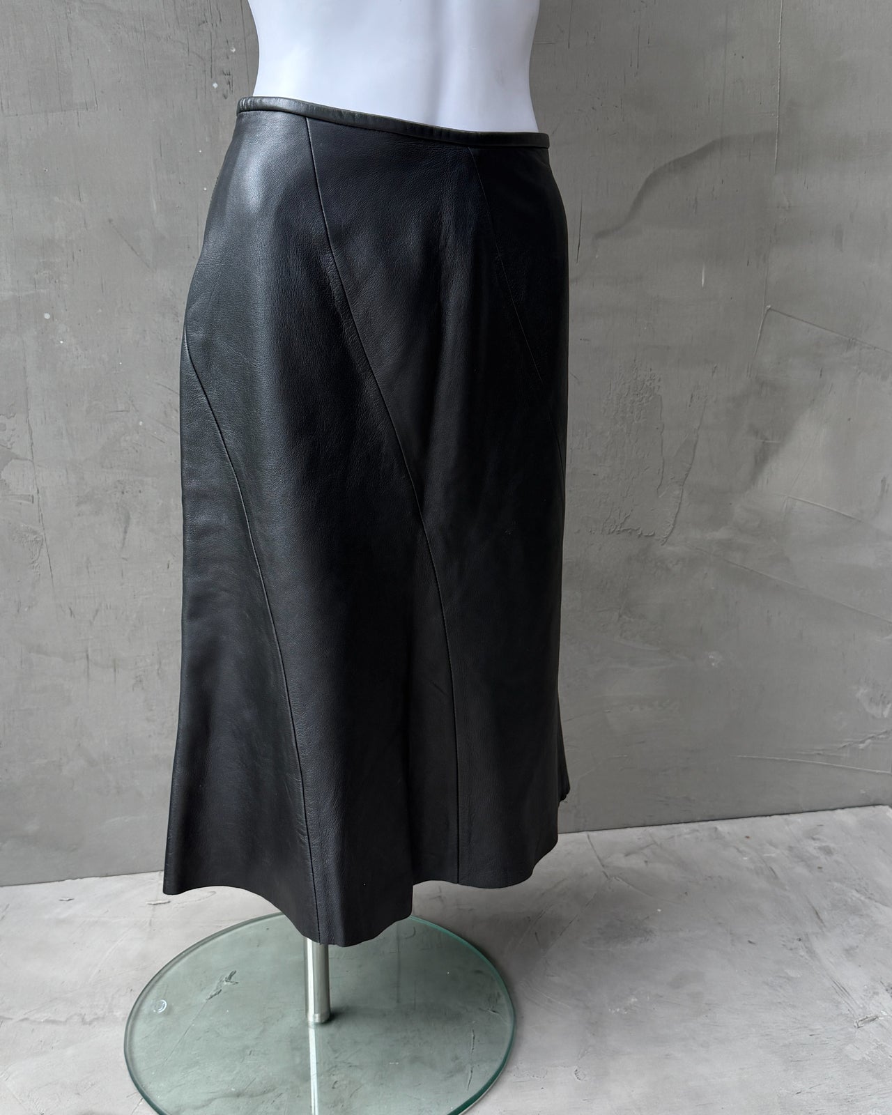 Armani Collezioni Leather Midi Skirt – XS-on a concrete background