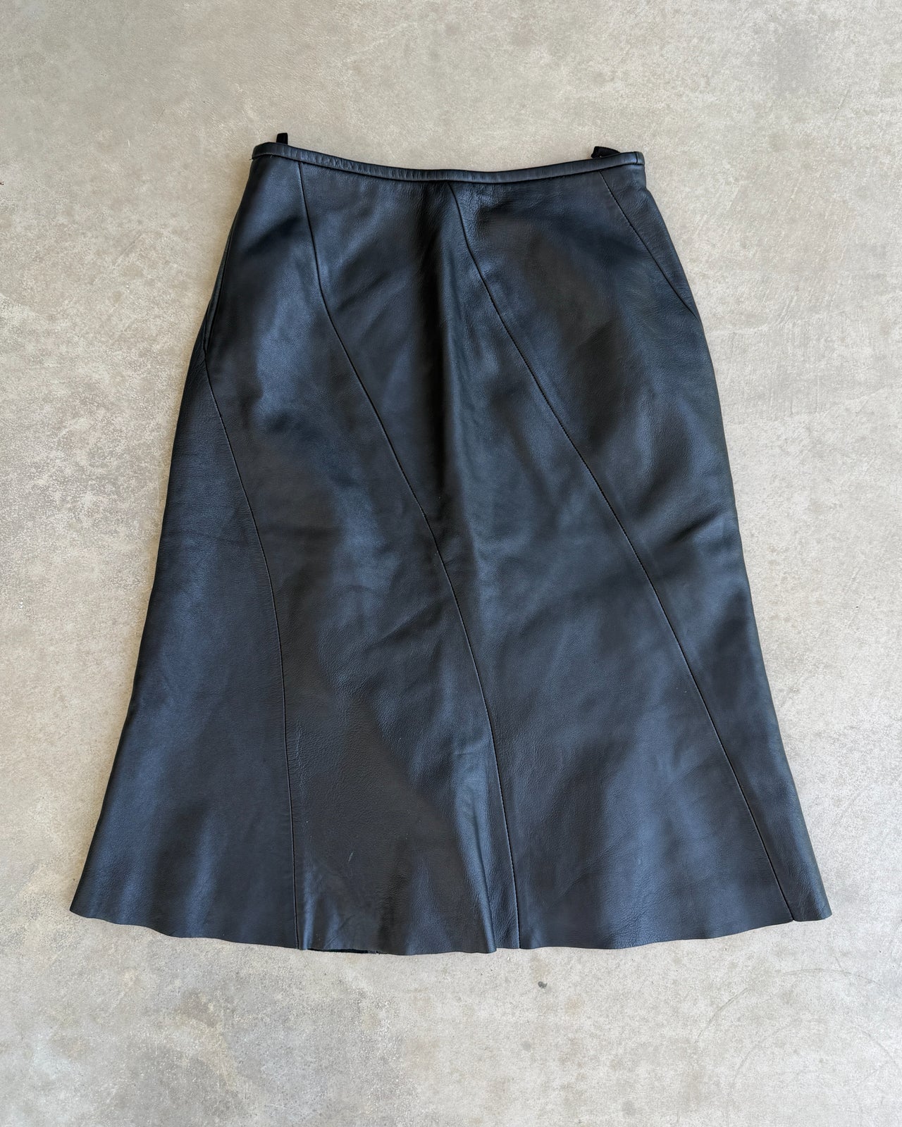 Armani Collezioni Leather Midi Skirt – XS-on a concrete background