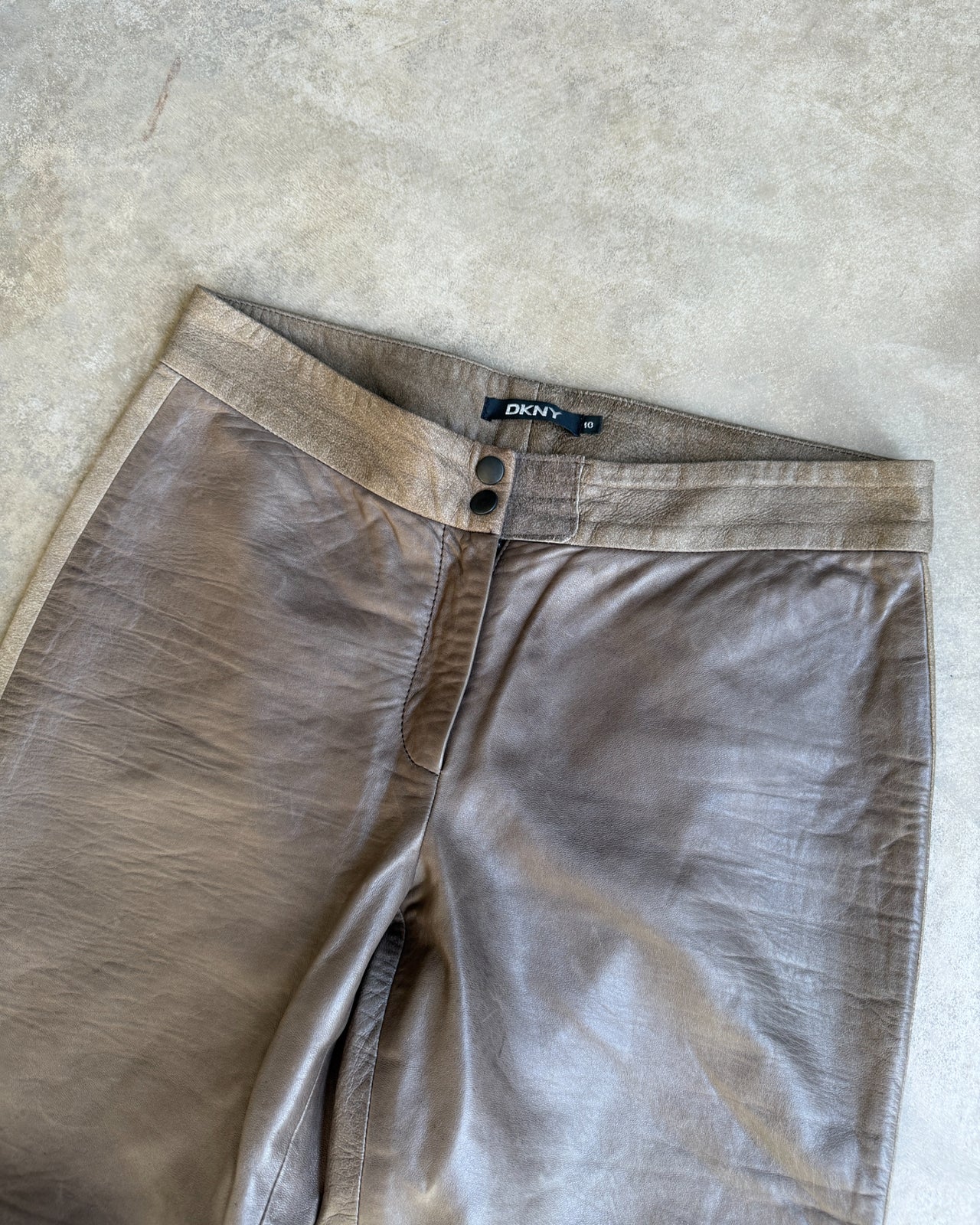 DKNY Brown Two Tone Wide Leg Leather Trousers – S/M-on a concrete background