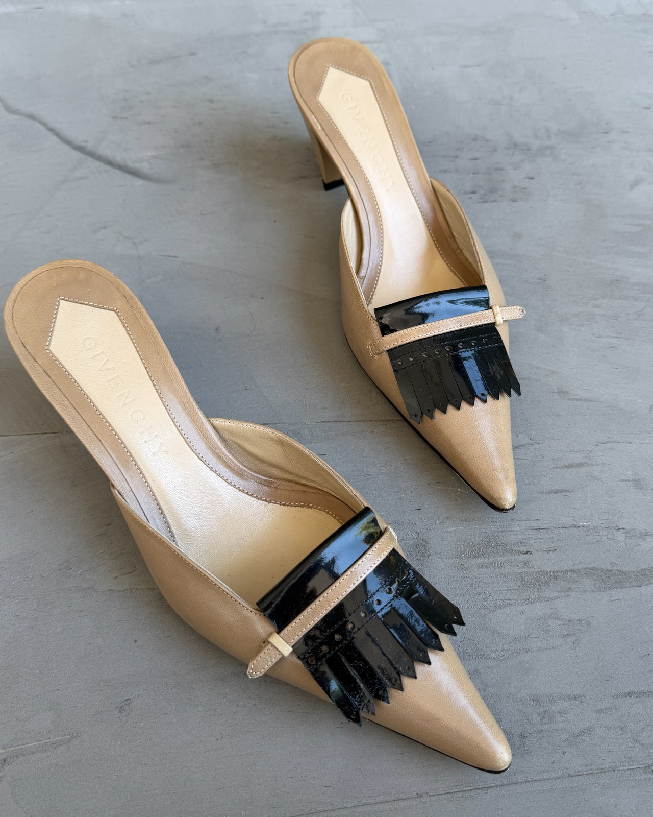 Givenchy Beige Leather Kitten Heel Mule – EU 37.5-on a concrete background