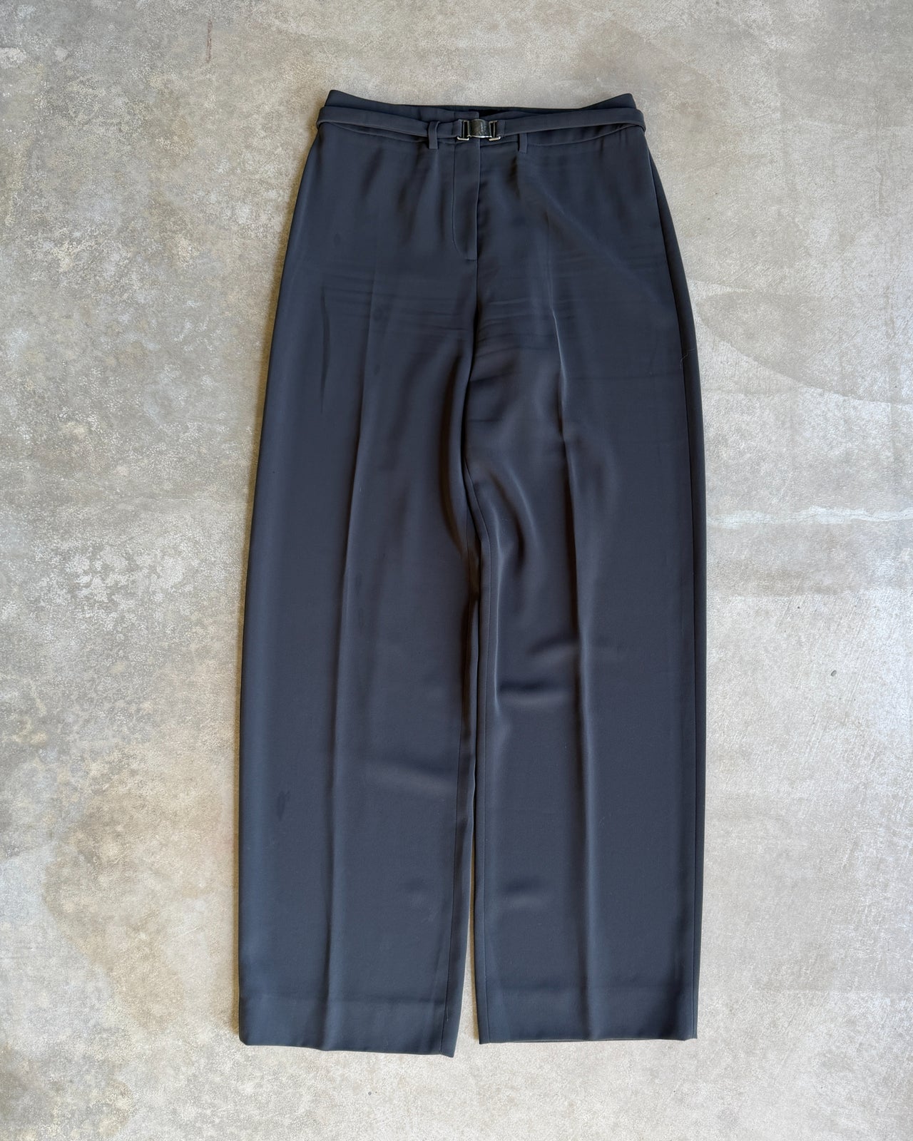 Giorgio Armani Grey Polyester Wide Leg Trousers – M-on a concrete background