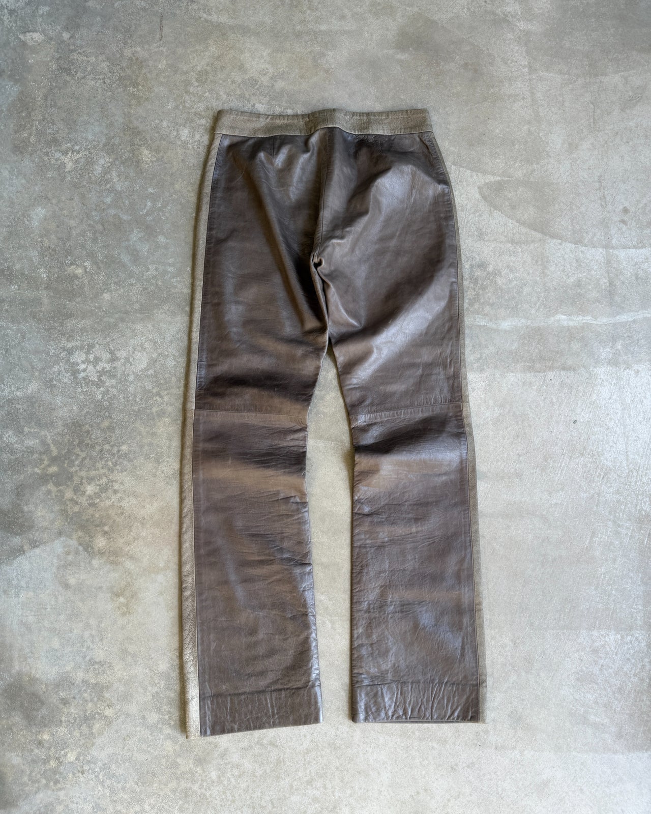 DKNY Brown Two Tone Wide Leg Leather Trousers – S/M-on a concrete background